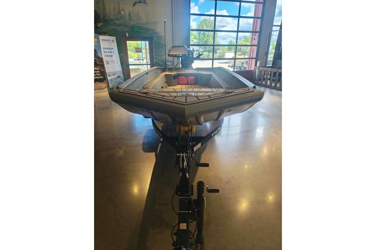 2026 Tracker Grizzly 1650 T Prairie Wings Edition boat displayed indoors.