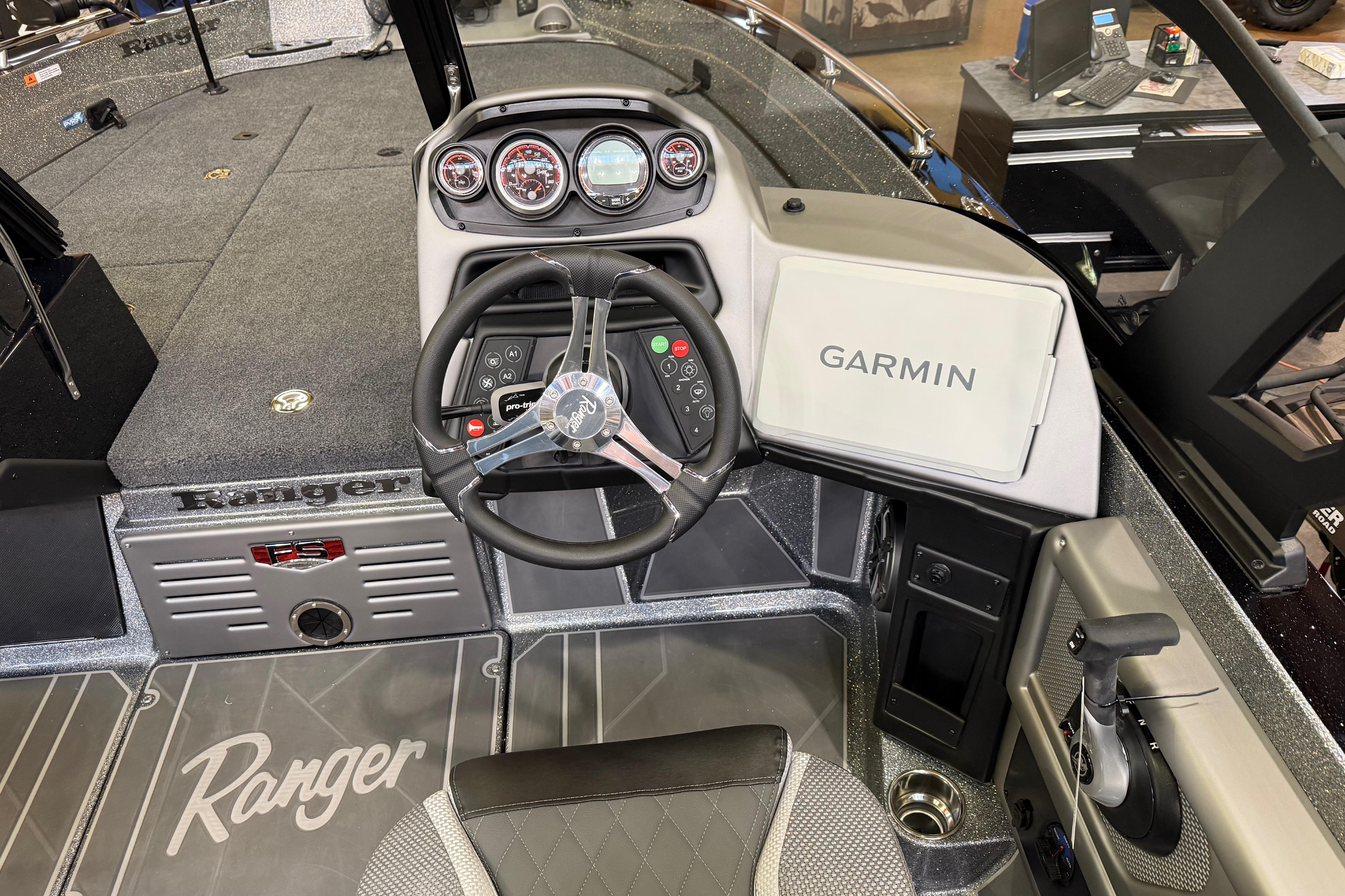 2026 Ranger 621FS Cup-Equipped boat dashboard with Garmin navigation system.
