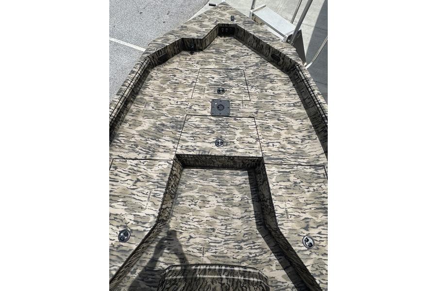 2027 Excel 230 Bay Pro Elite boat deck with camouflage pattern.