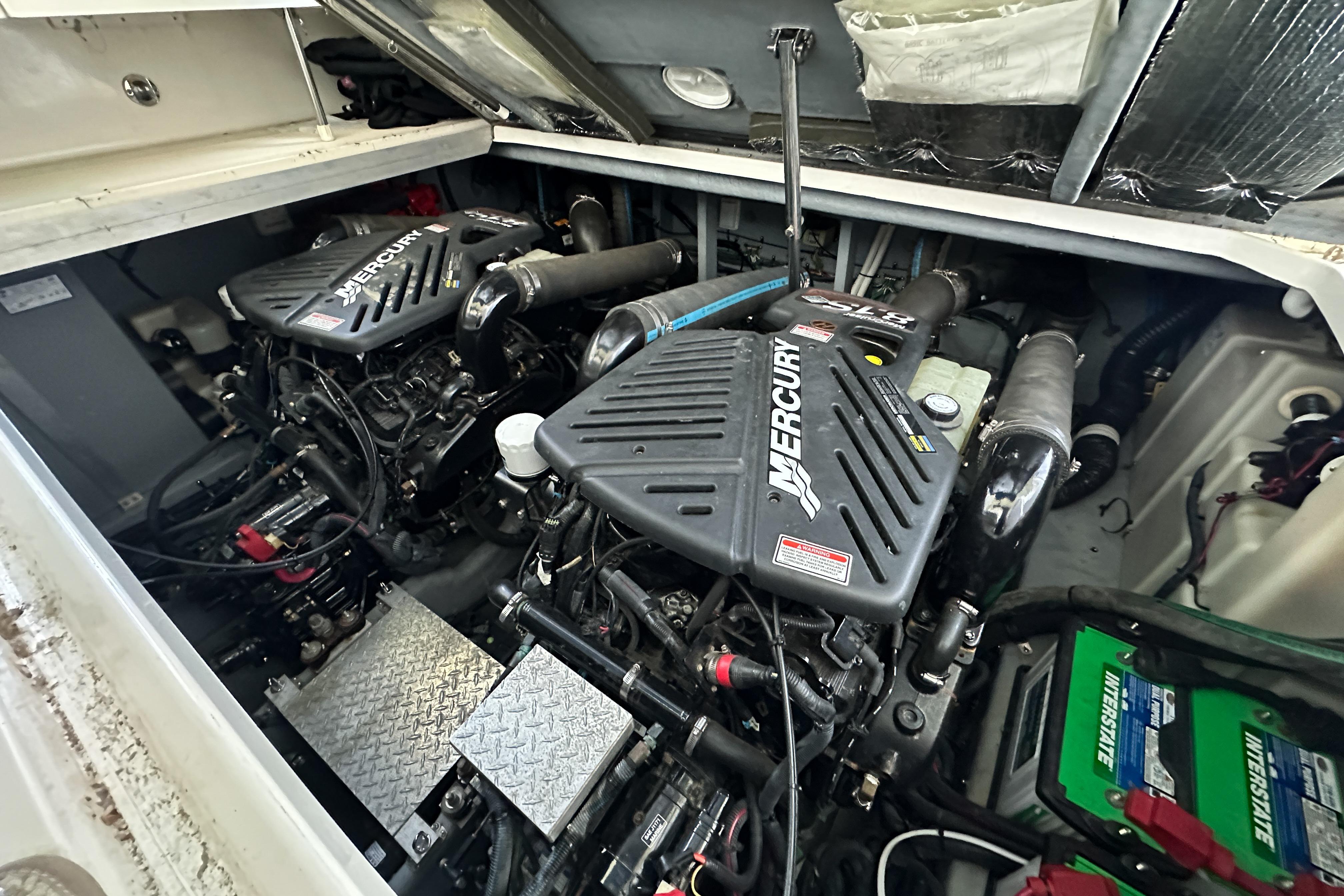 Engine compartment of a 2001 Sea Ray 410 Sundancer with twin Mercury engines.