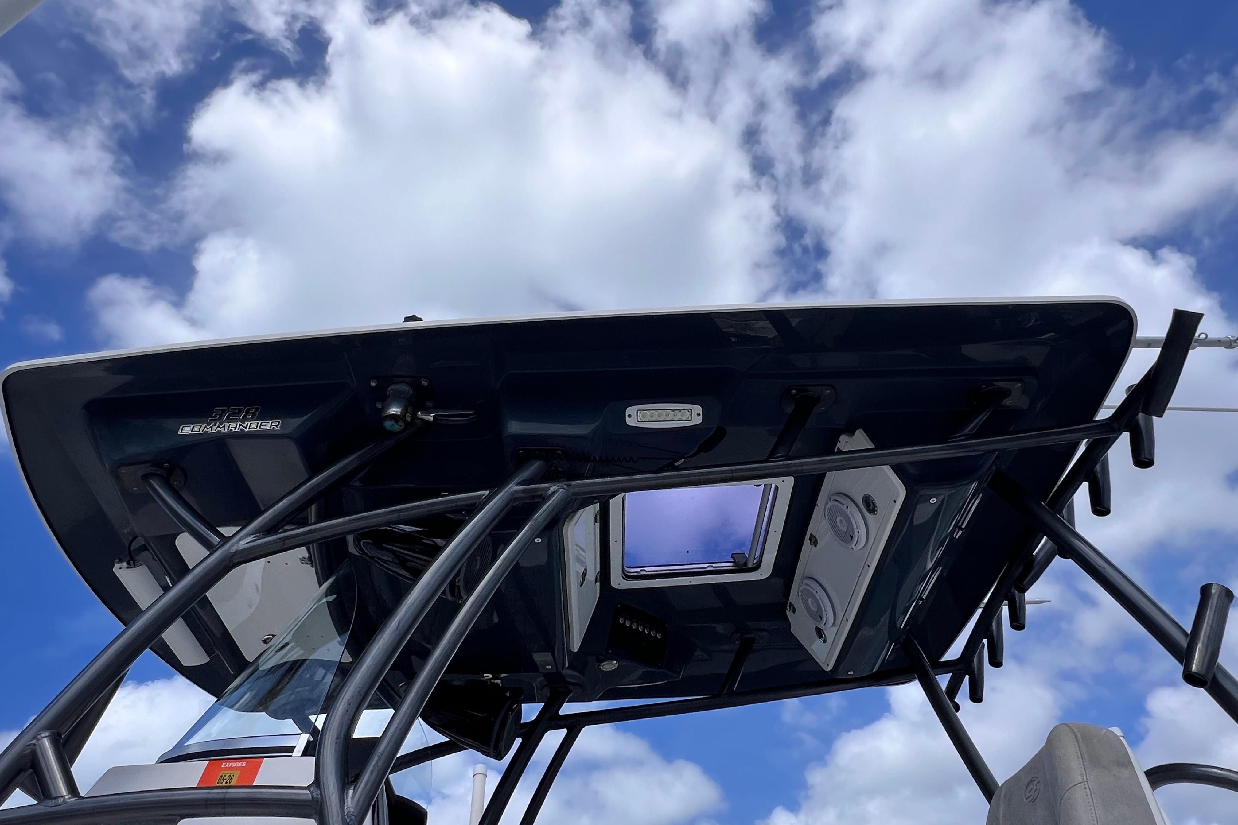 2019 Sea Fox 328 Commander boat roof against a cloudy sky.