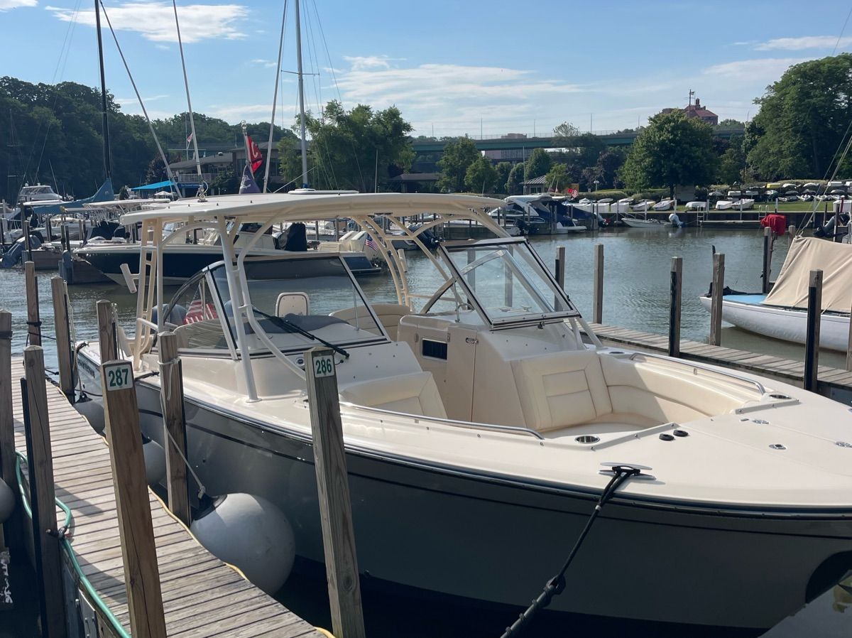 2019 Grady-White Freedom 307 boat docked at marina.