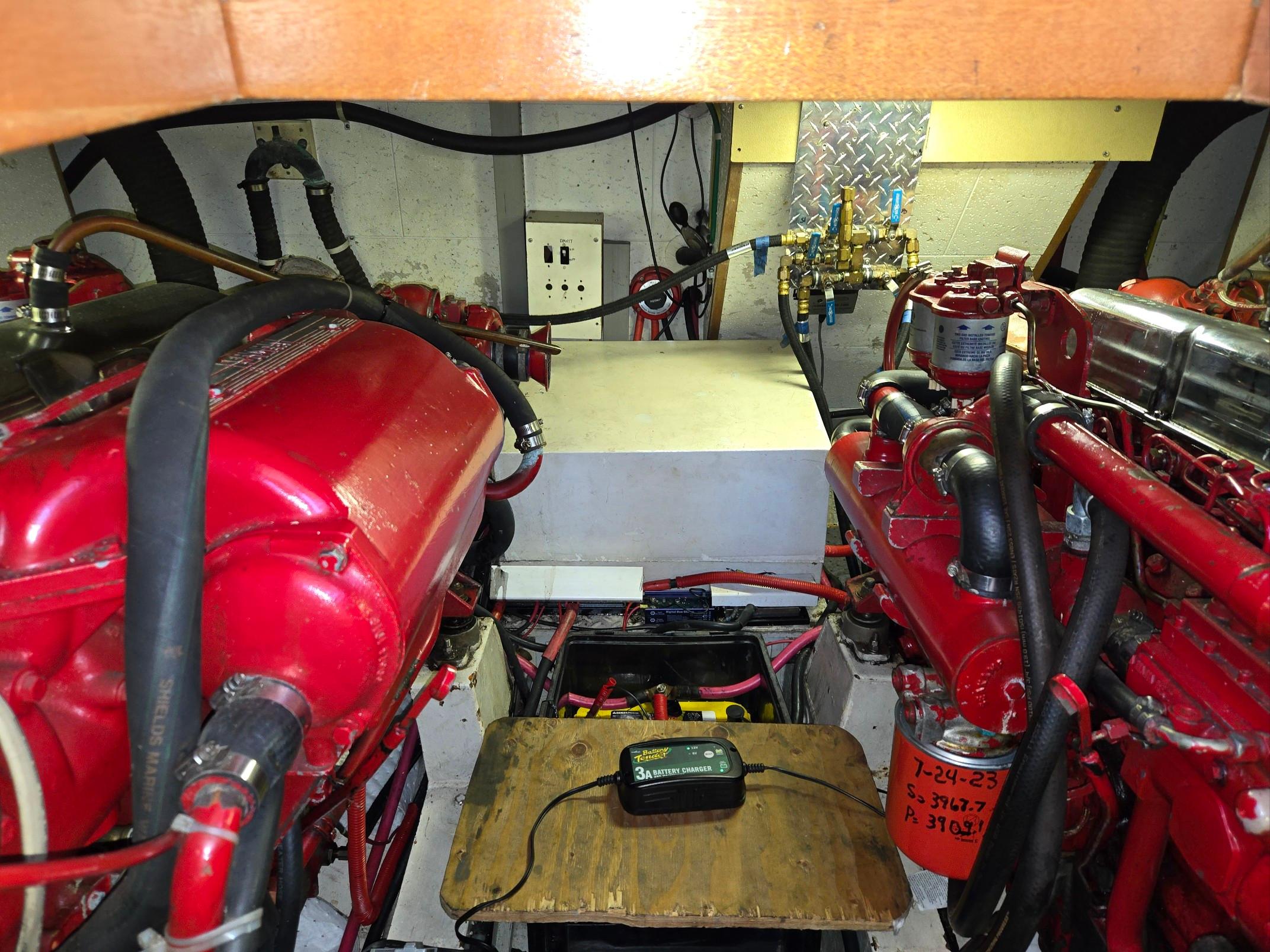 Engine room of 1983 Ocean Alexander 43 Flush Aft Deck - engine compartment