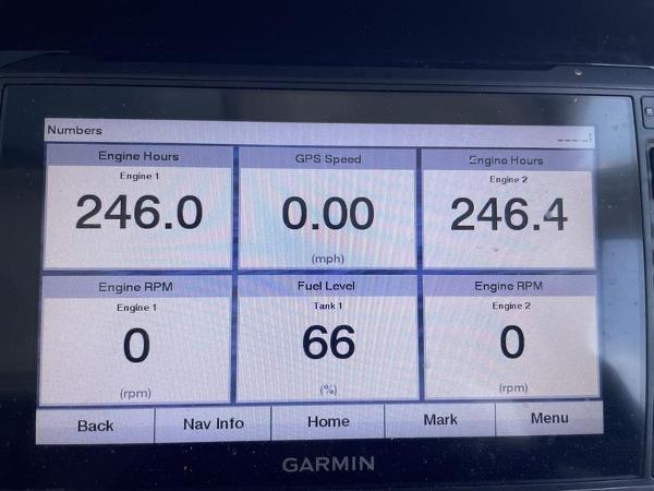 Garmin display showing engine hours, GPS speed, and fuel level on 2022 Finseeker 280 DC.