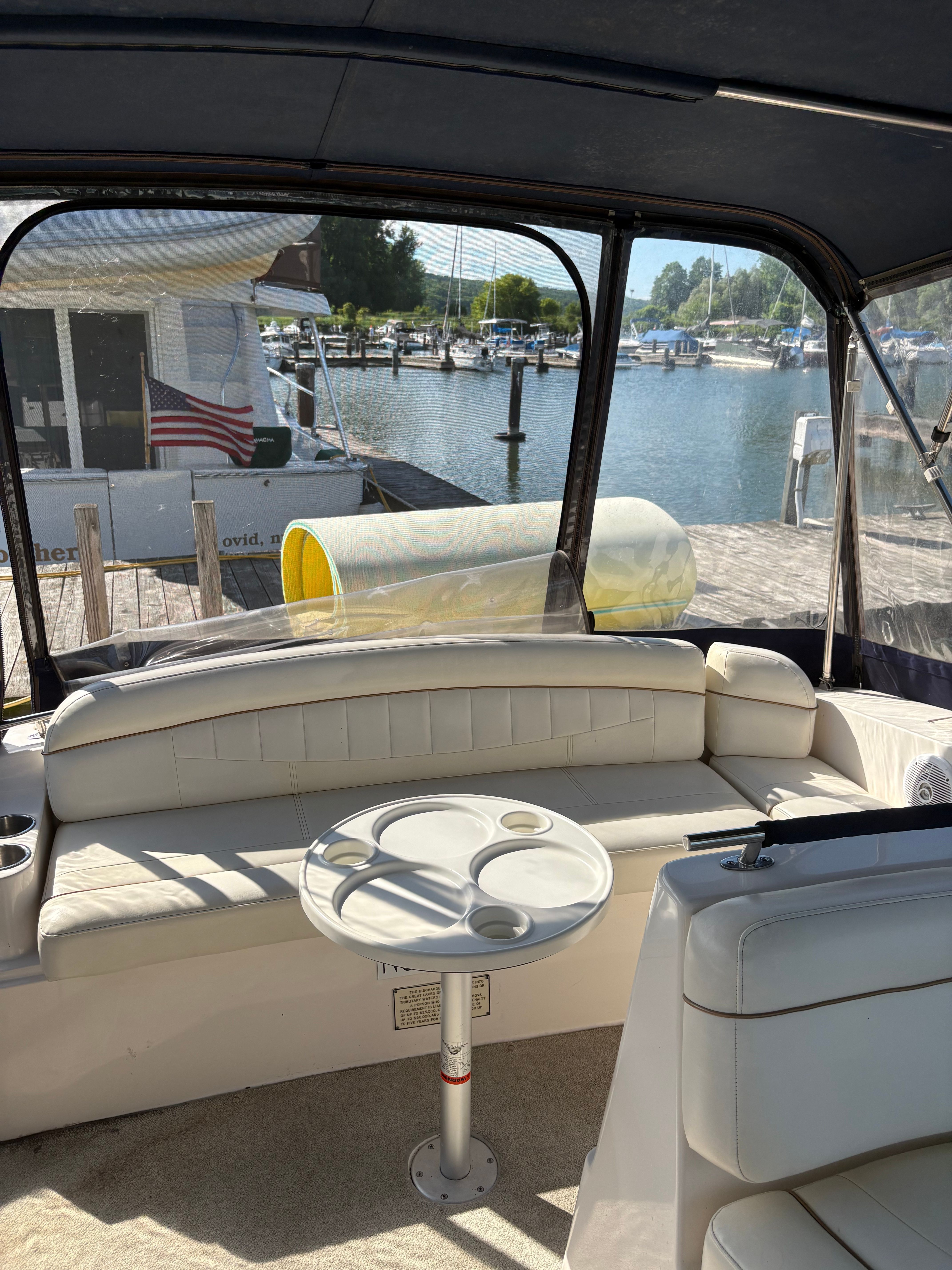 Interior of a Rinker Fiesta Vee 342 yacht docked at marina.
