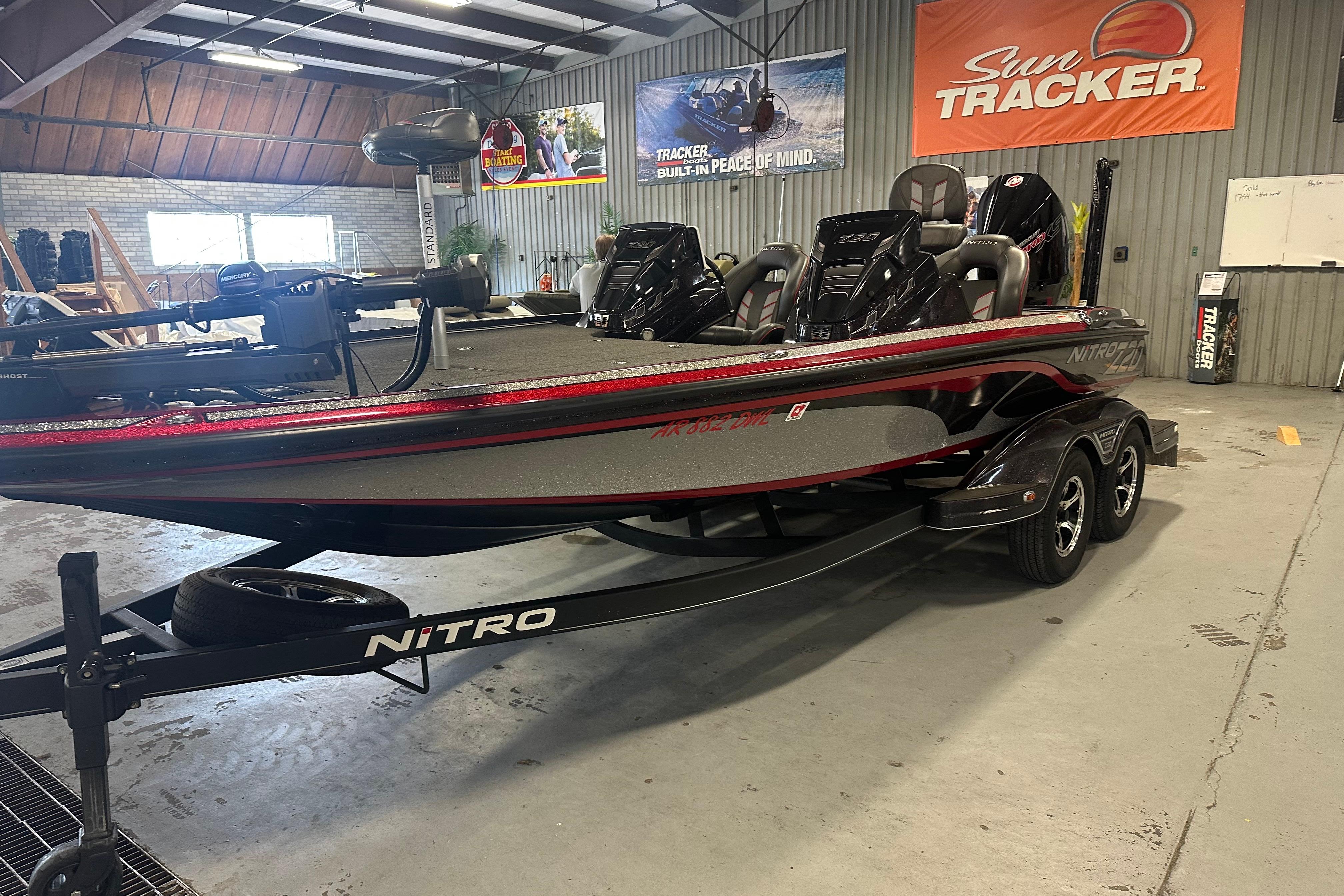 2022 Nitro Z20 Pro bass boat in showroom, featuring sleek design and dual seating.