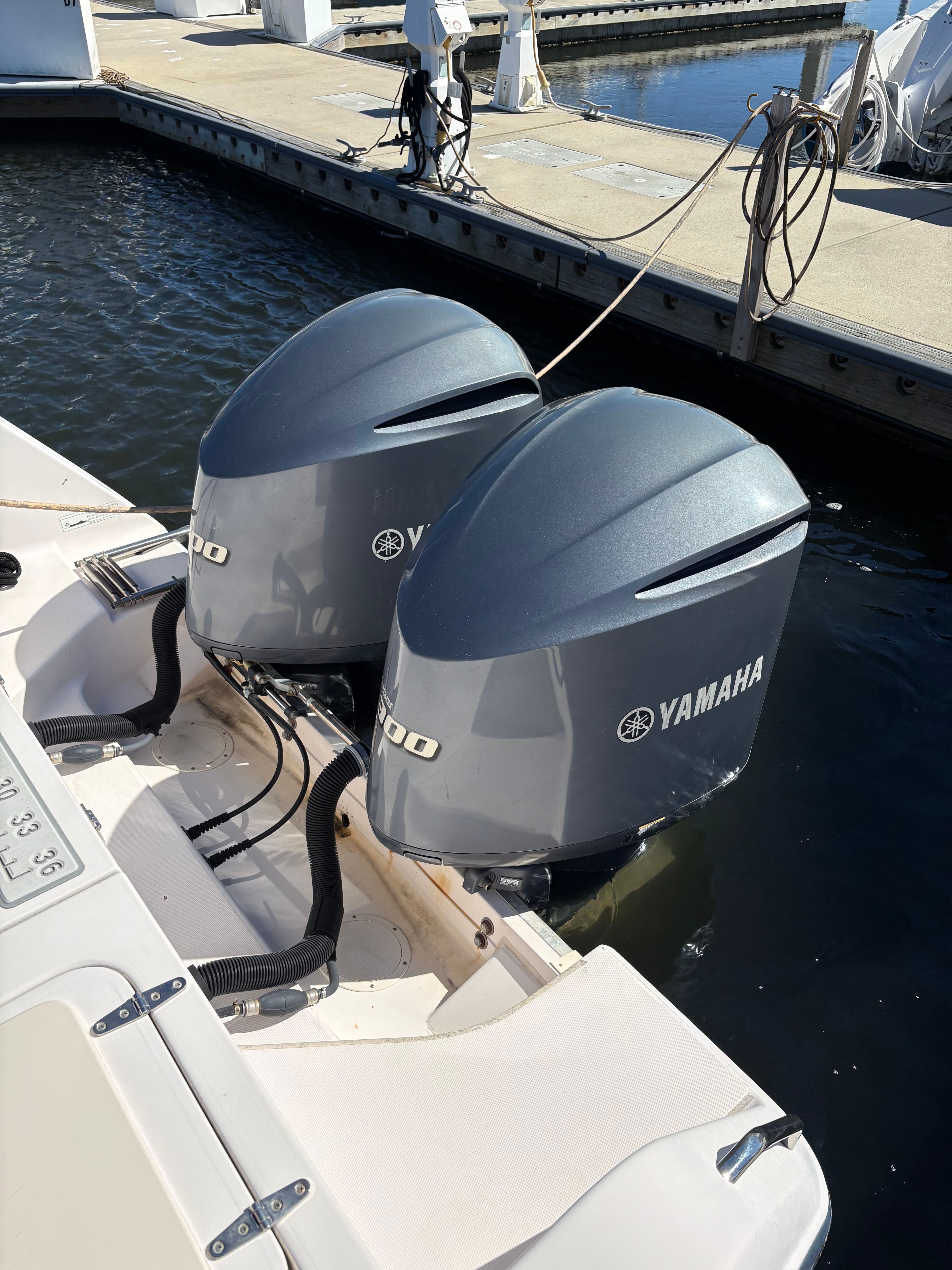 2009 Grady-White Chesapeake 290 with Yamaha outboard motors at dock.