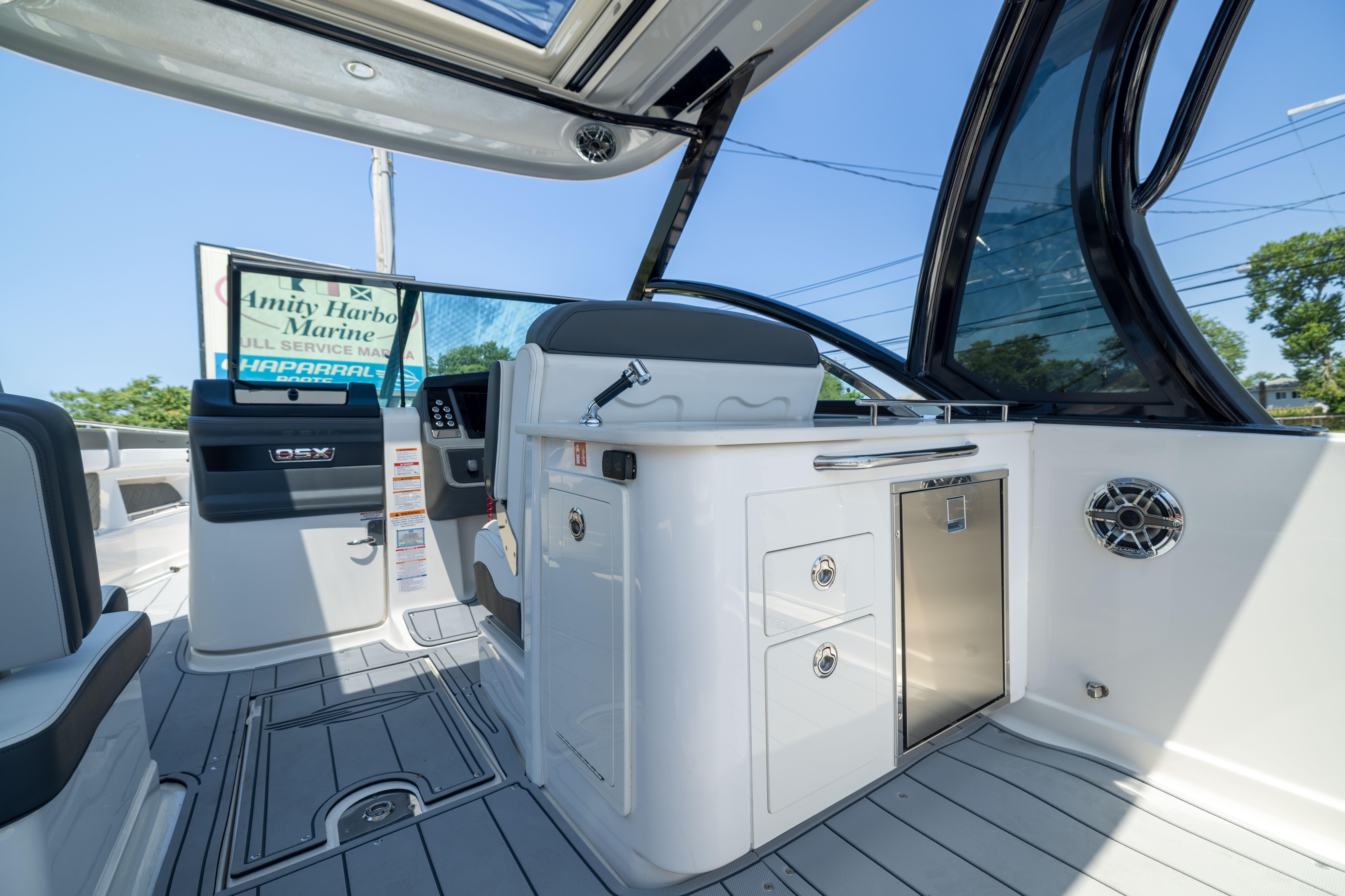 2026 Chaparral 310 OSX boat interior with sleek design and modern amenities.