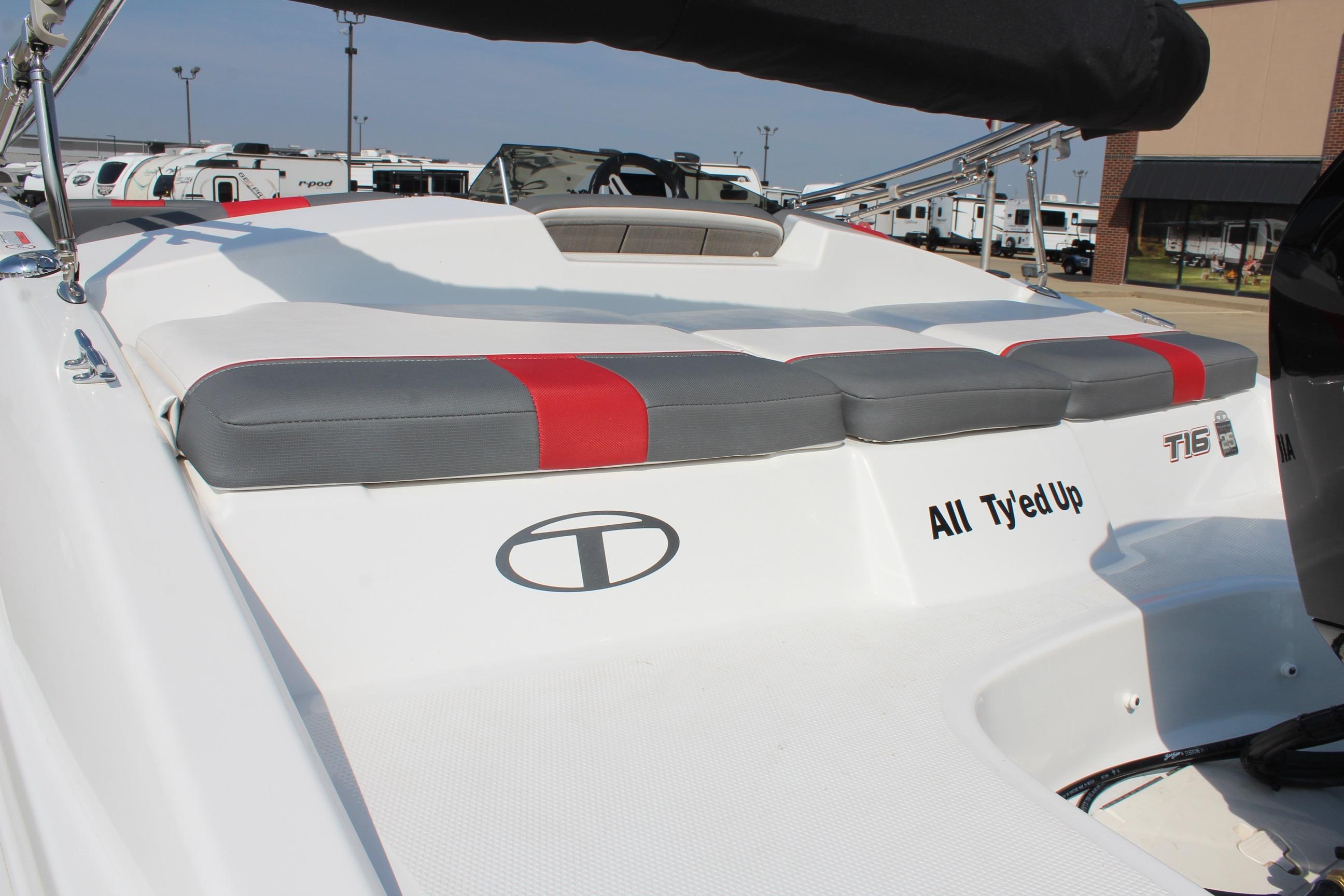 2023 Tahoe T16 boat with cushioned seating and "All Ty'ed Up" text on the stern.