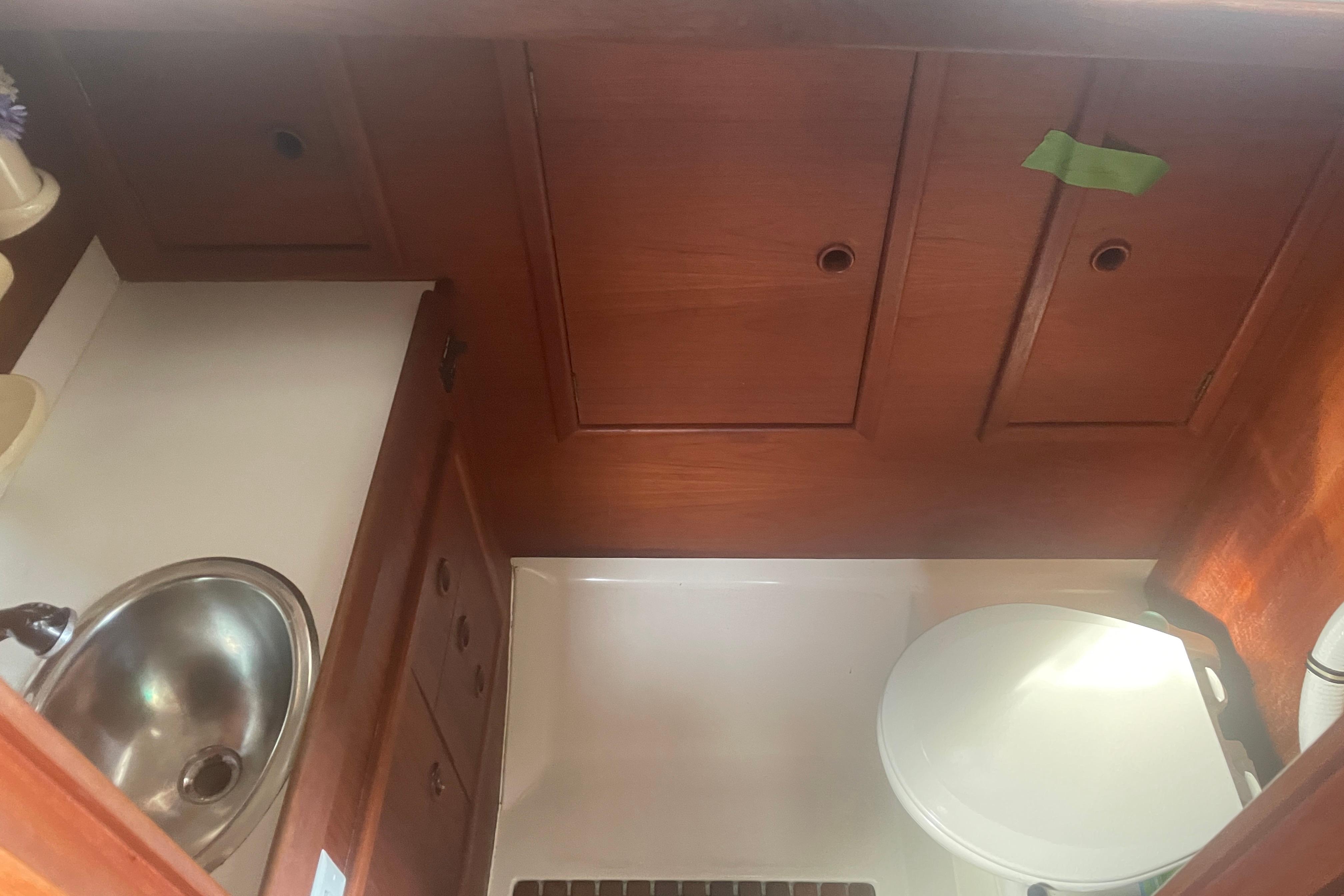 Interior of 1981 Nonsuch 30 Classic sailboat with sink and toilet.