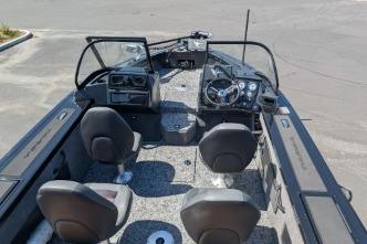 2026 Tracker Targa V-18 WT boat interior with seating and steering console.