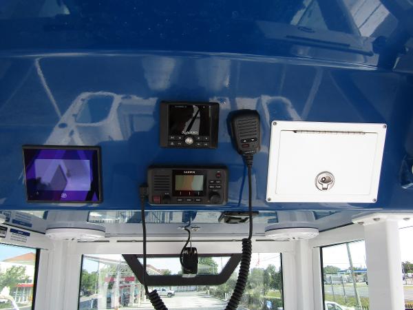 2024 Wellcraft 263 Fisherman boat dashboard with navigation and communication equipment.