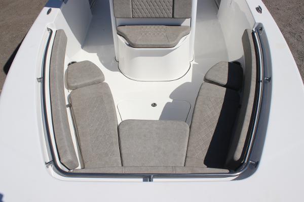 2023 Sea Pro 239 Center Console boat with spacious seating area and cushioned seats.