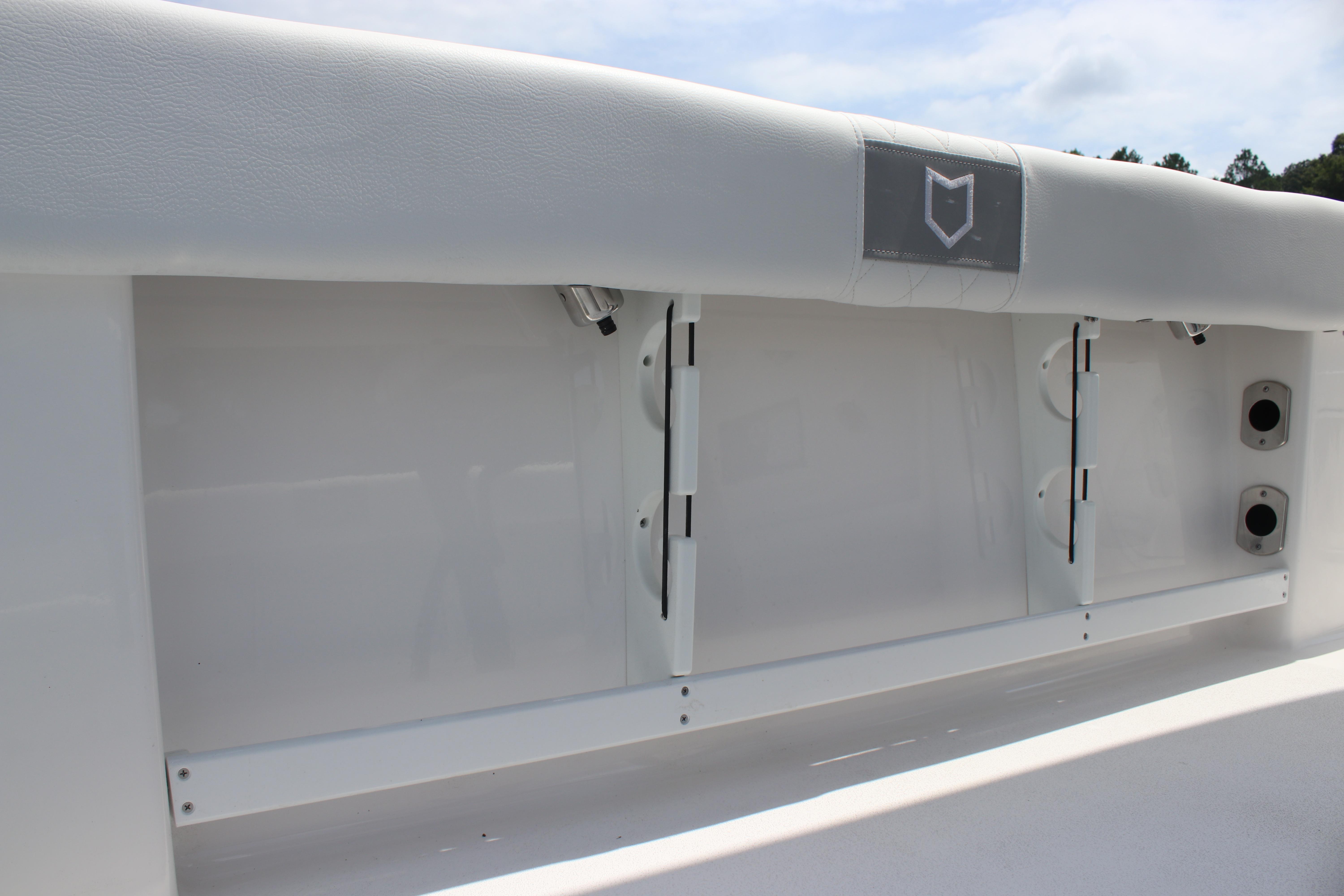 2026 Sea Fox 248 Commander boat interior detail with white cushioned seating.