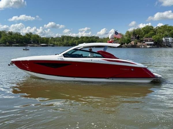 2022 Cobalt A36BR boat on a lake under a clear blue sky.