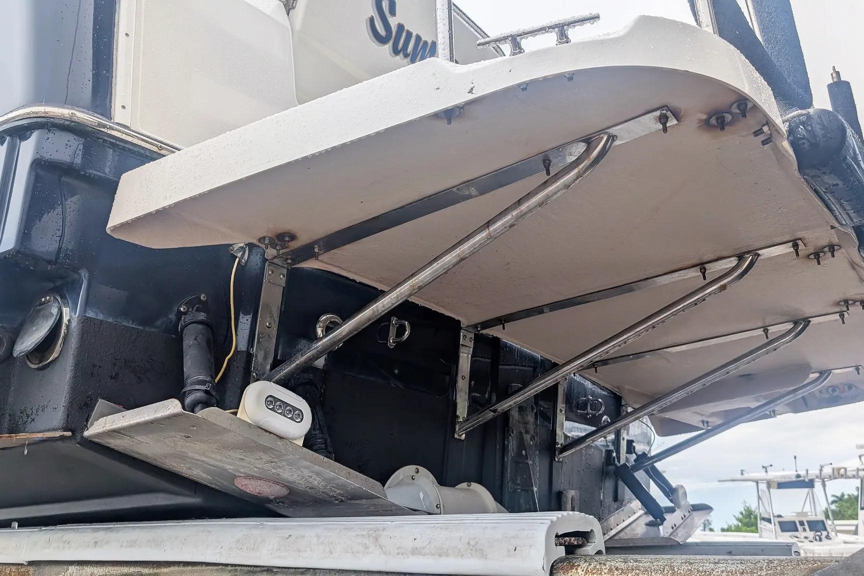 2015 Ranger Tugs R-29 S boat stern with swim platform and support structure.