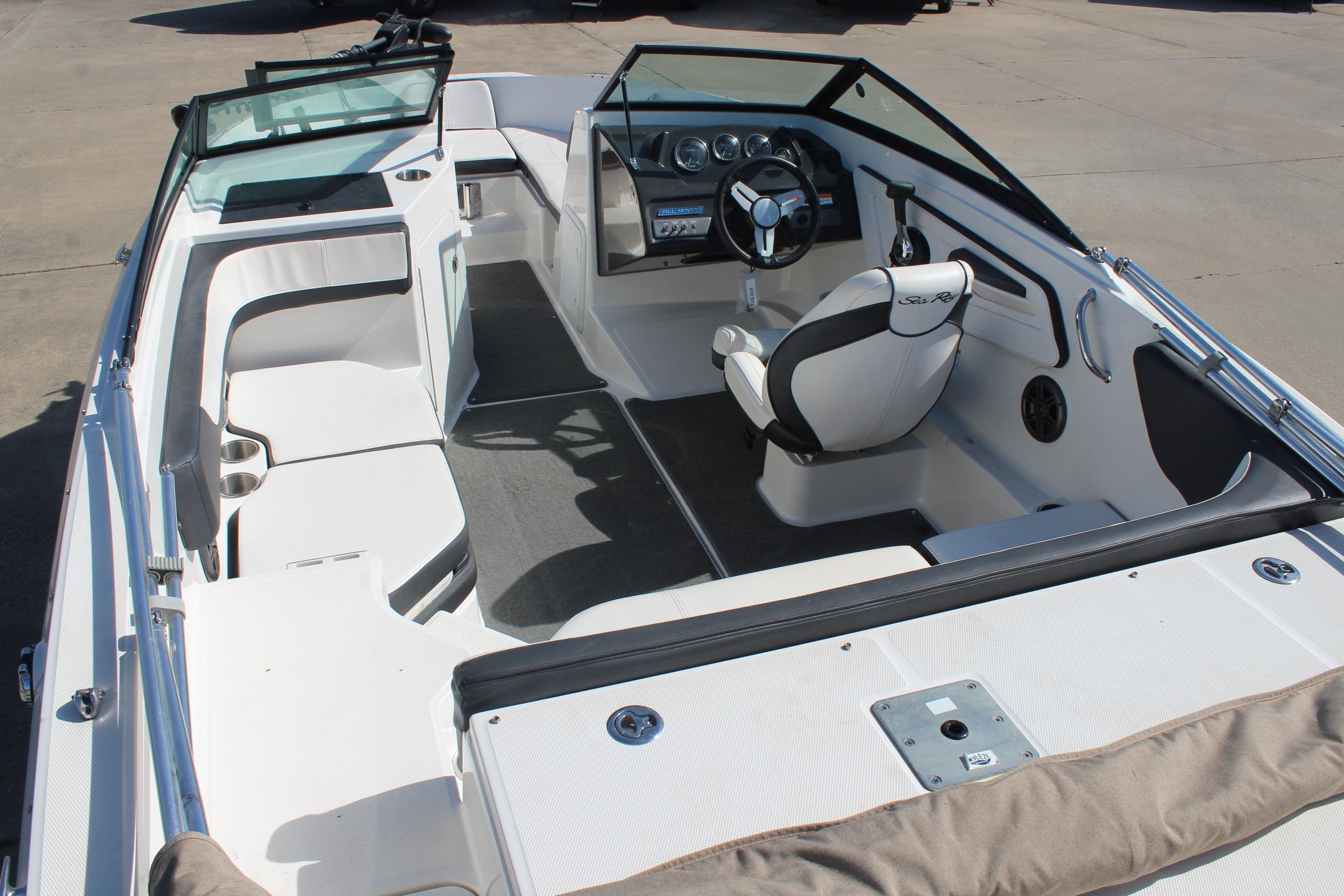 2015 Sea Ray 19 SPX OB boat interior with seating and steering wheel.