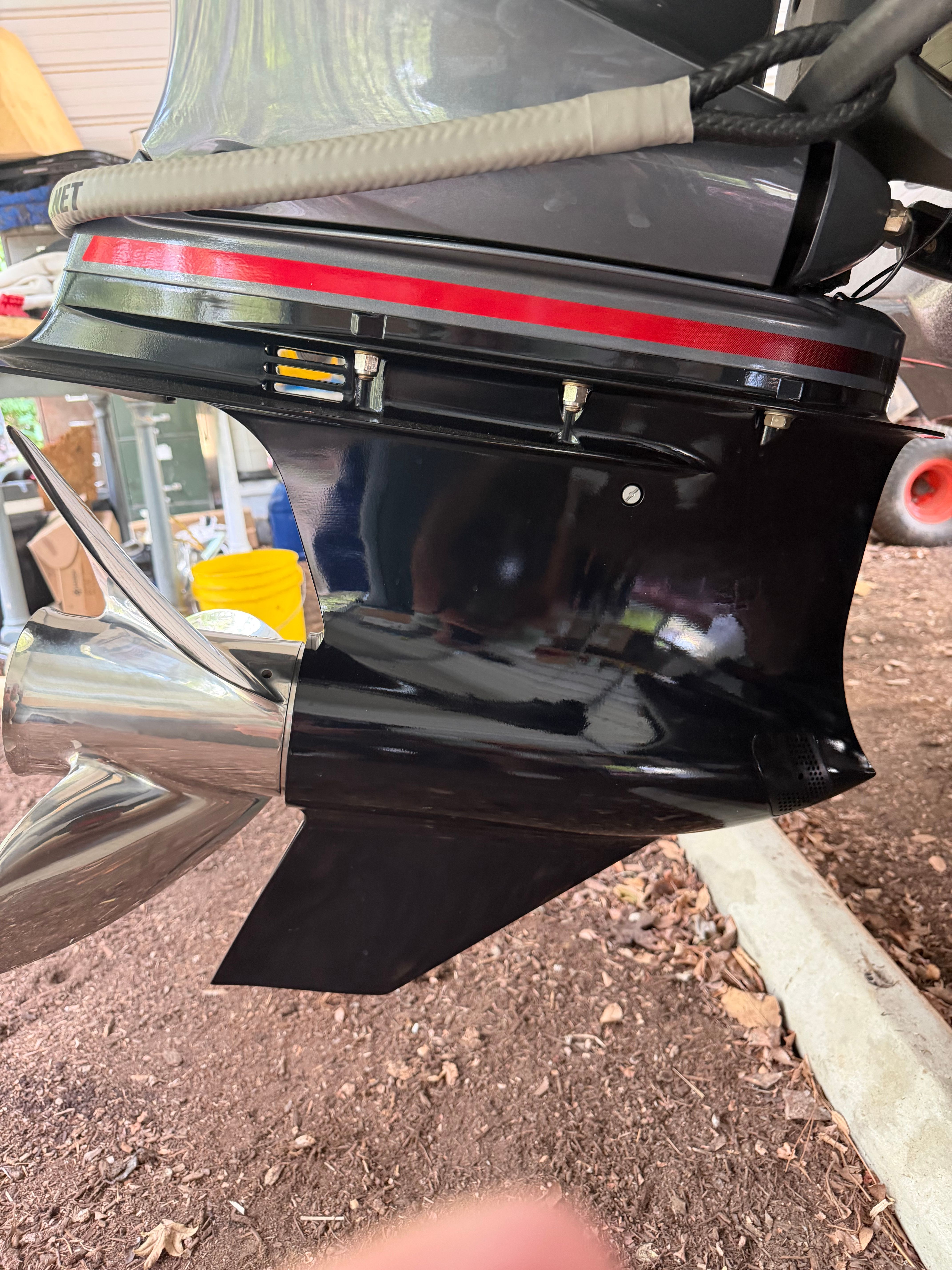 Close-up of a boat propeller and motor, partially from a Skeeter ZX250 boat.