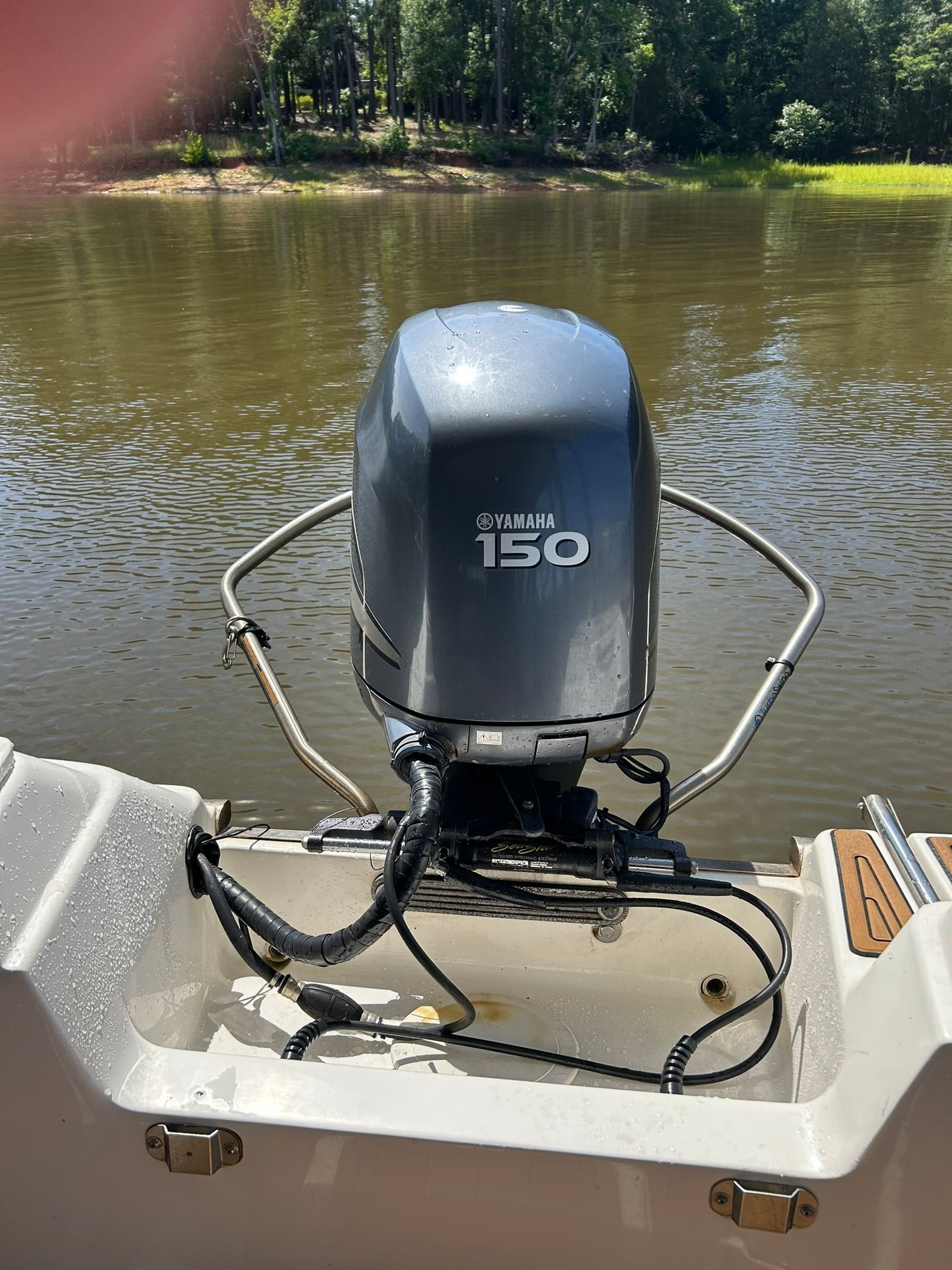 Yamaha 150 outboard motor on Key West boat by the water.