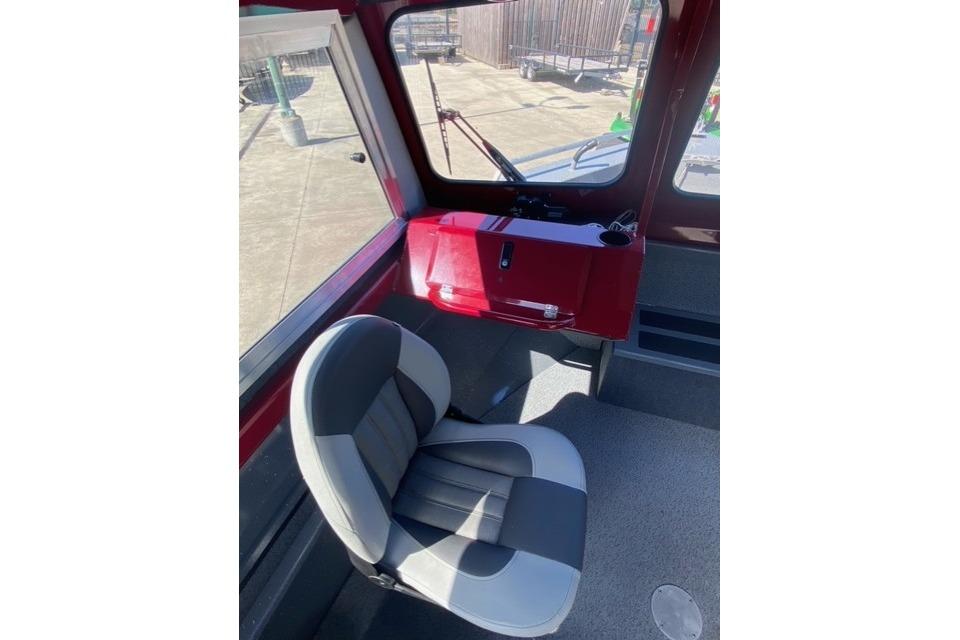 Interior of 2023 Spartan 200 Astoria boat with a gray and black seat.