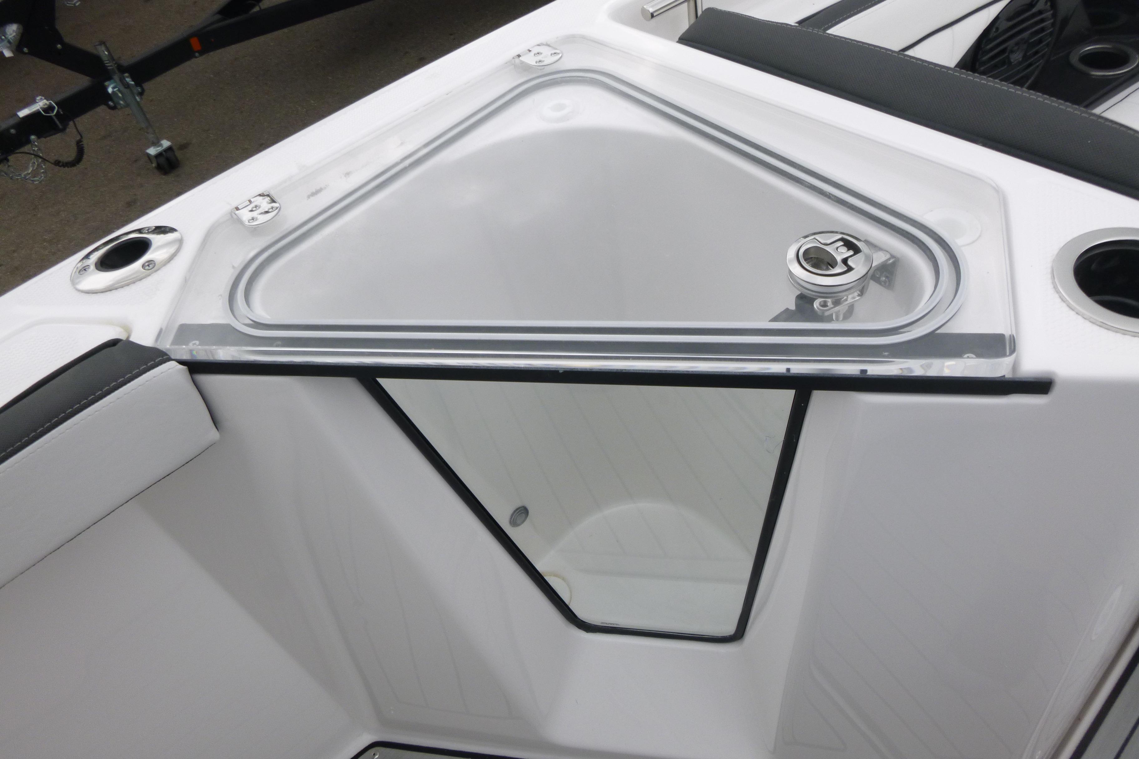 2026 Yamaha Boats 255 FSH Sport H, featuring a sleek storage compartment with secure latch.