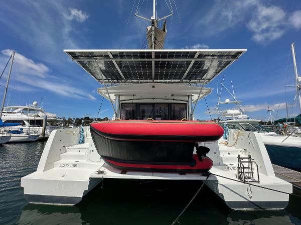 2021 Bali 4.8 catamaran with solar panels docked at marina.