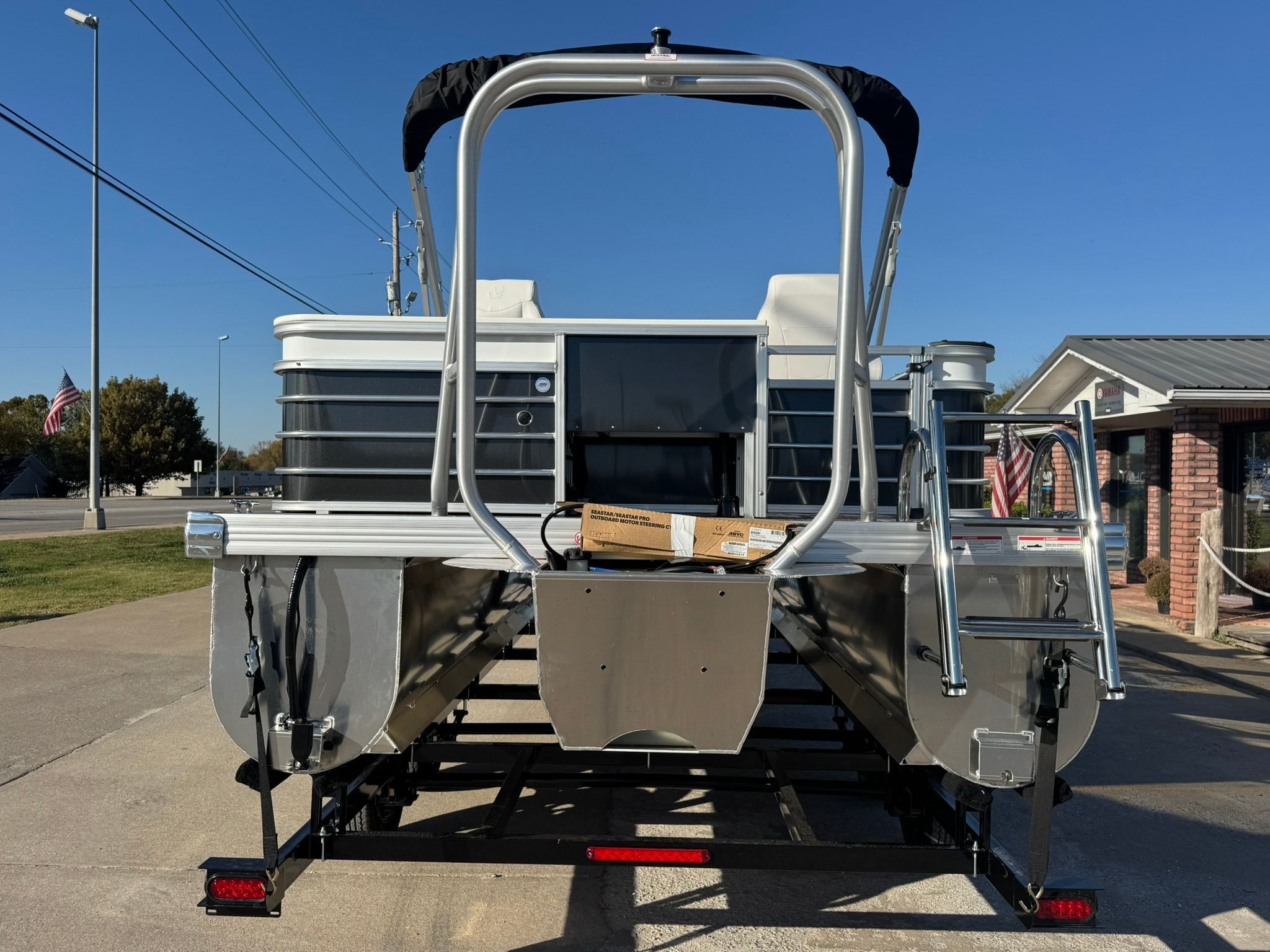 Rear view of 2026 Landau 23C Atlantis pontoon boat.