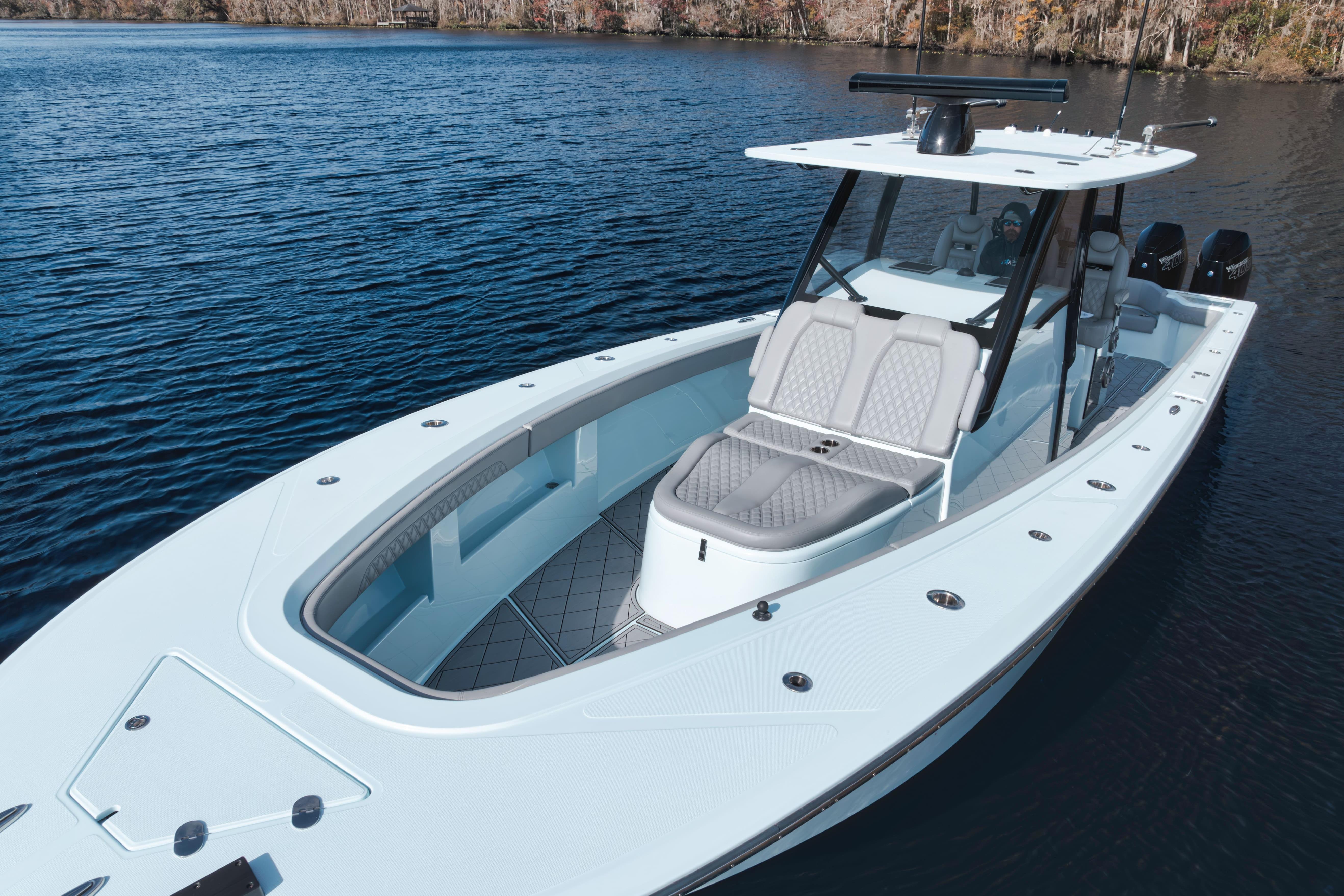 2026 Front Runner 39' Center Console boat on calm water, showcasing sleek design.