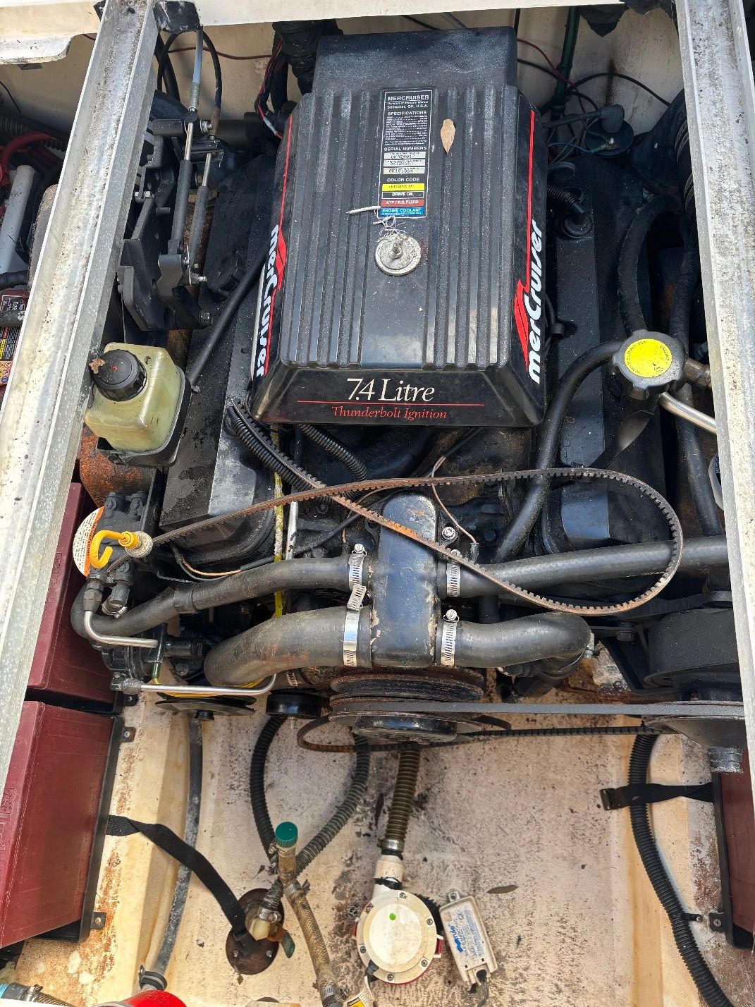 Engine compartment of a 1997 Donzi 275LXC with 7.4-liter MerCruiser engine.