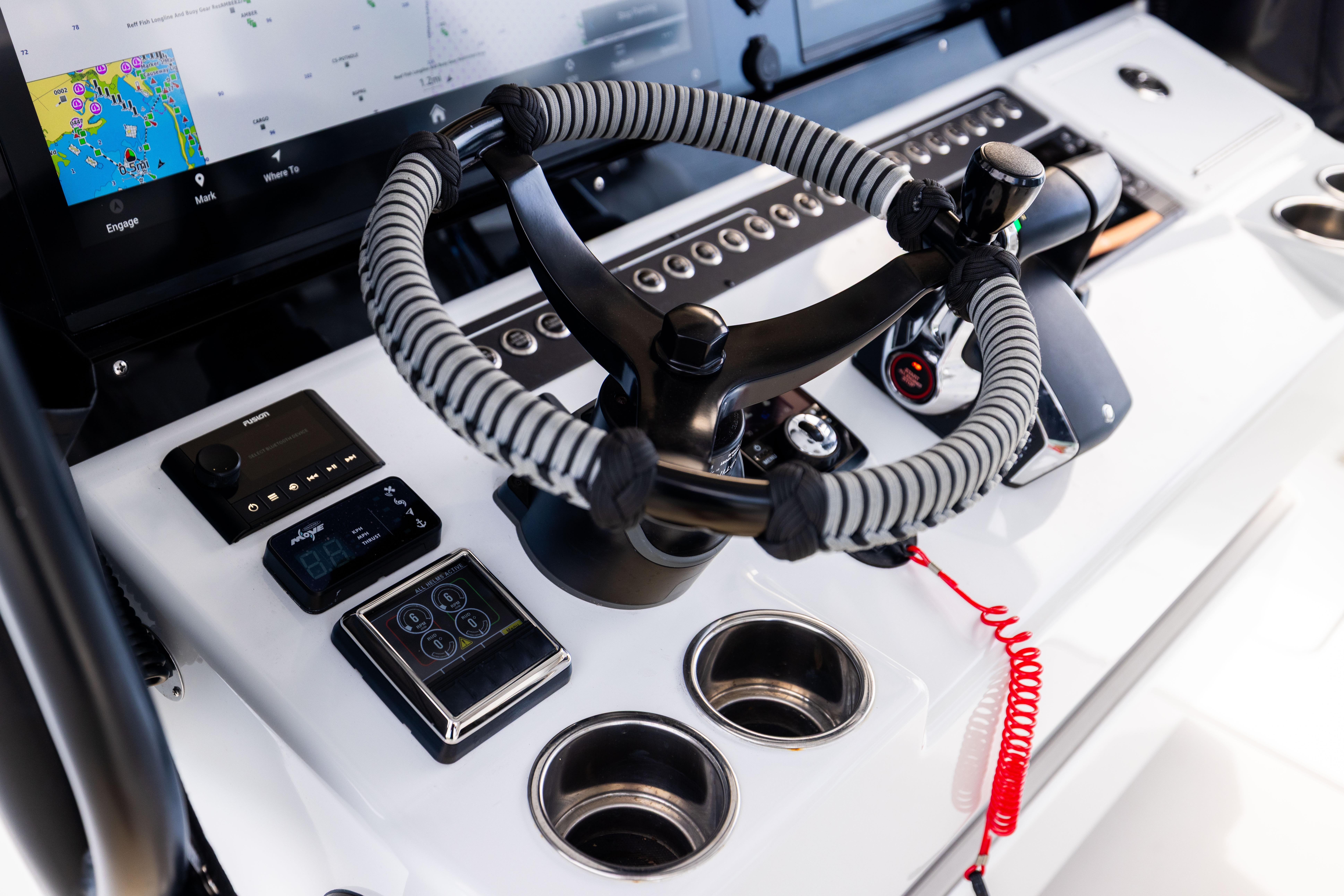 Helm of 2025 Freeman 42 LR boat with advanced navigation controls and displays.