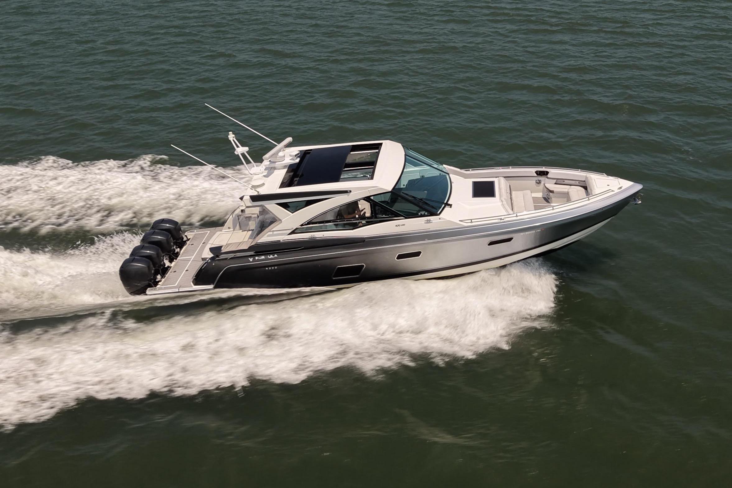 2019 Formula 430 Super Sport Crossover cruising on open water, showcasing sleek design and power.