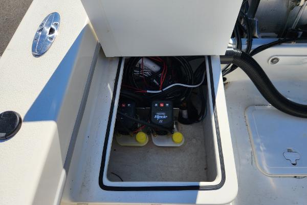 2023 May-Craft 208 CC boat battery compartment with wiring and switches.