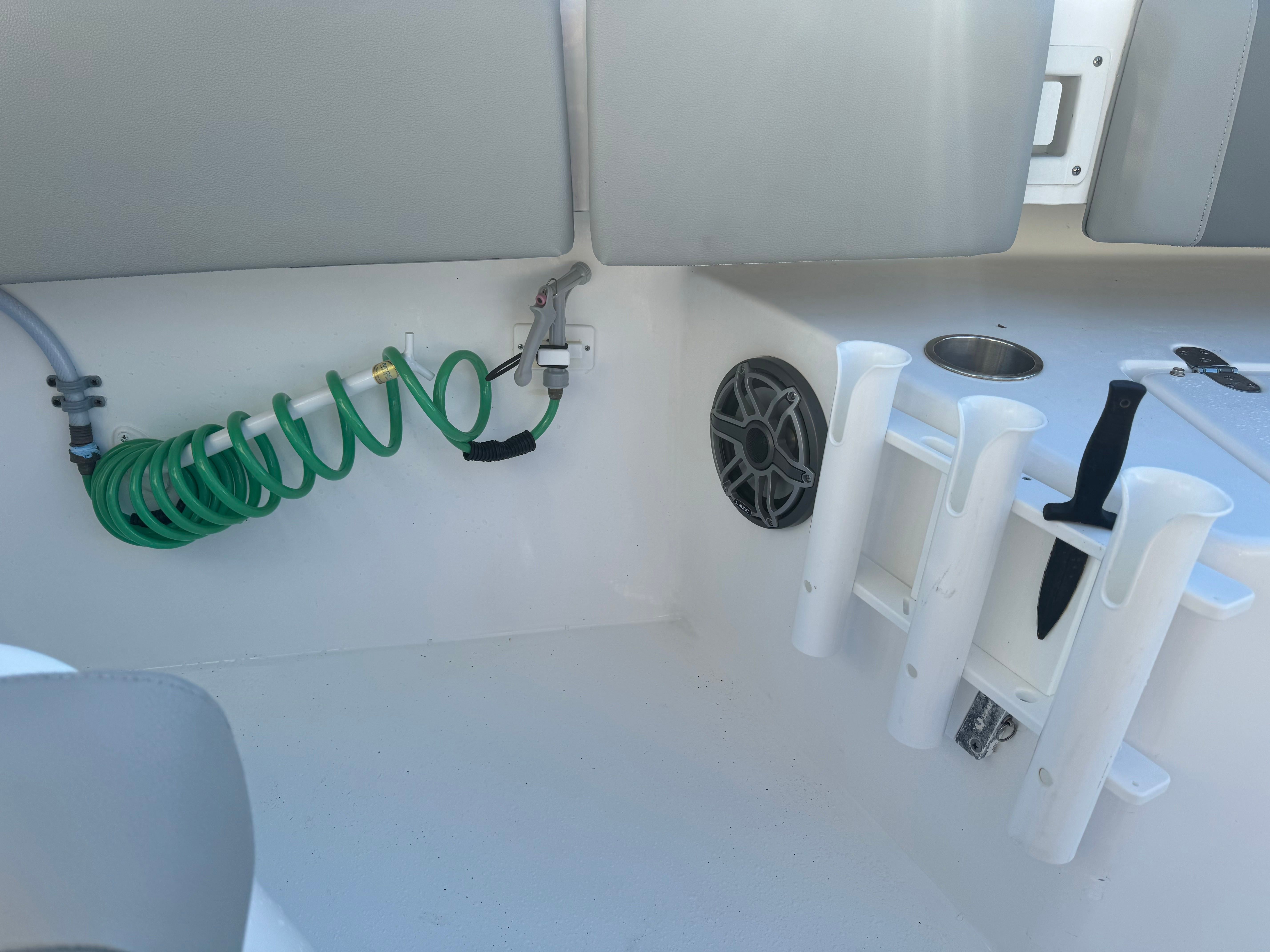 Interior of a 2021 Cape Horn 32 XS boat with fishing rod holders.