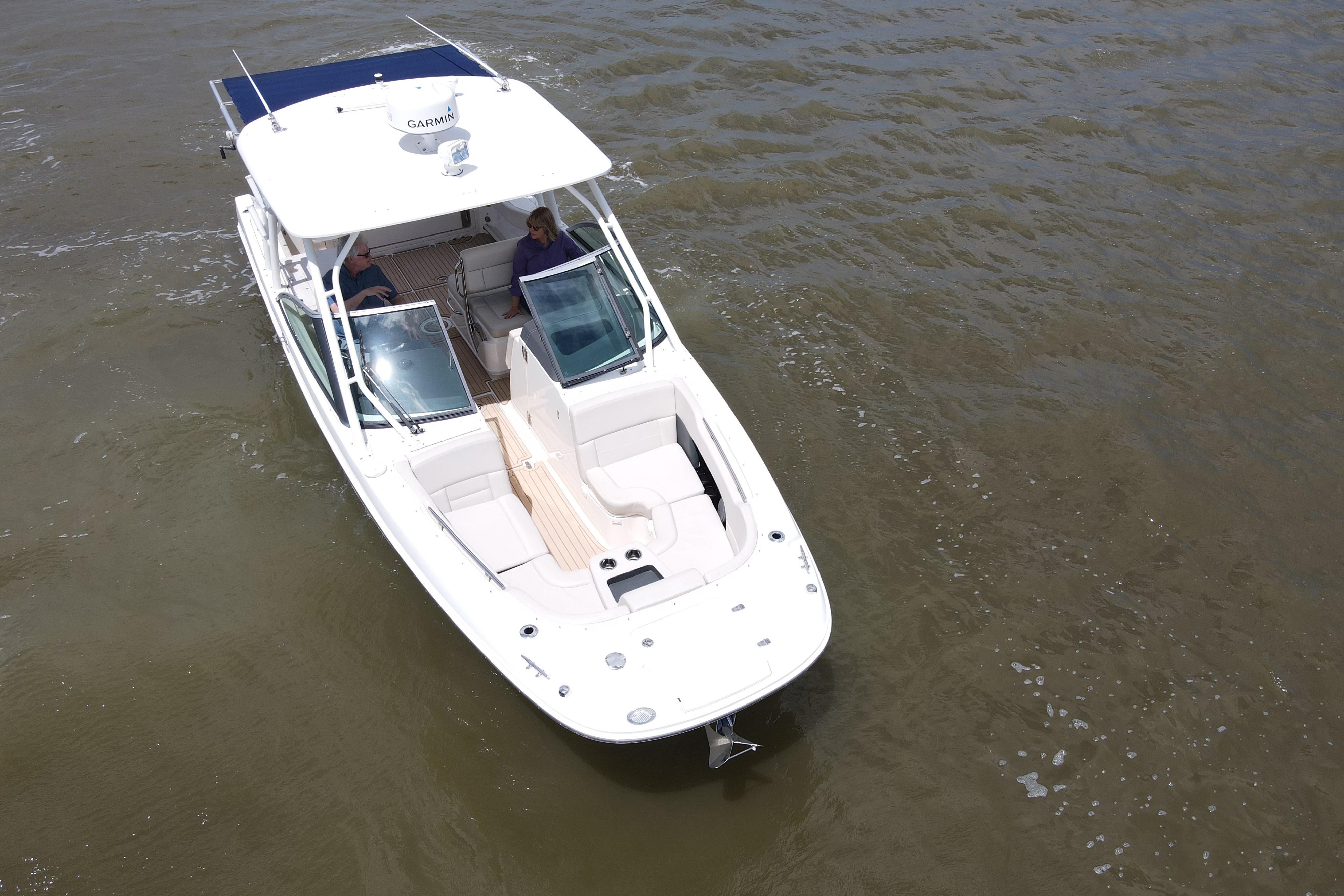 2017 Boston Whaler 270 Vantage boat cruising on open water, aerial view.