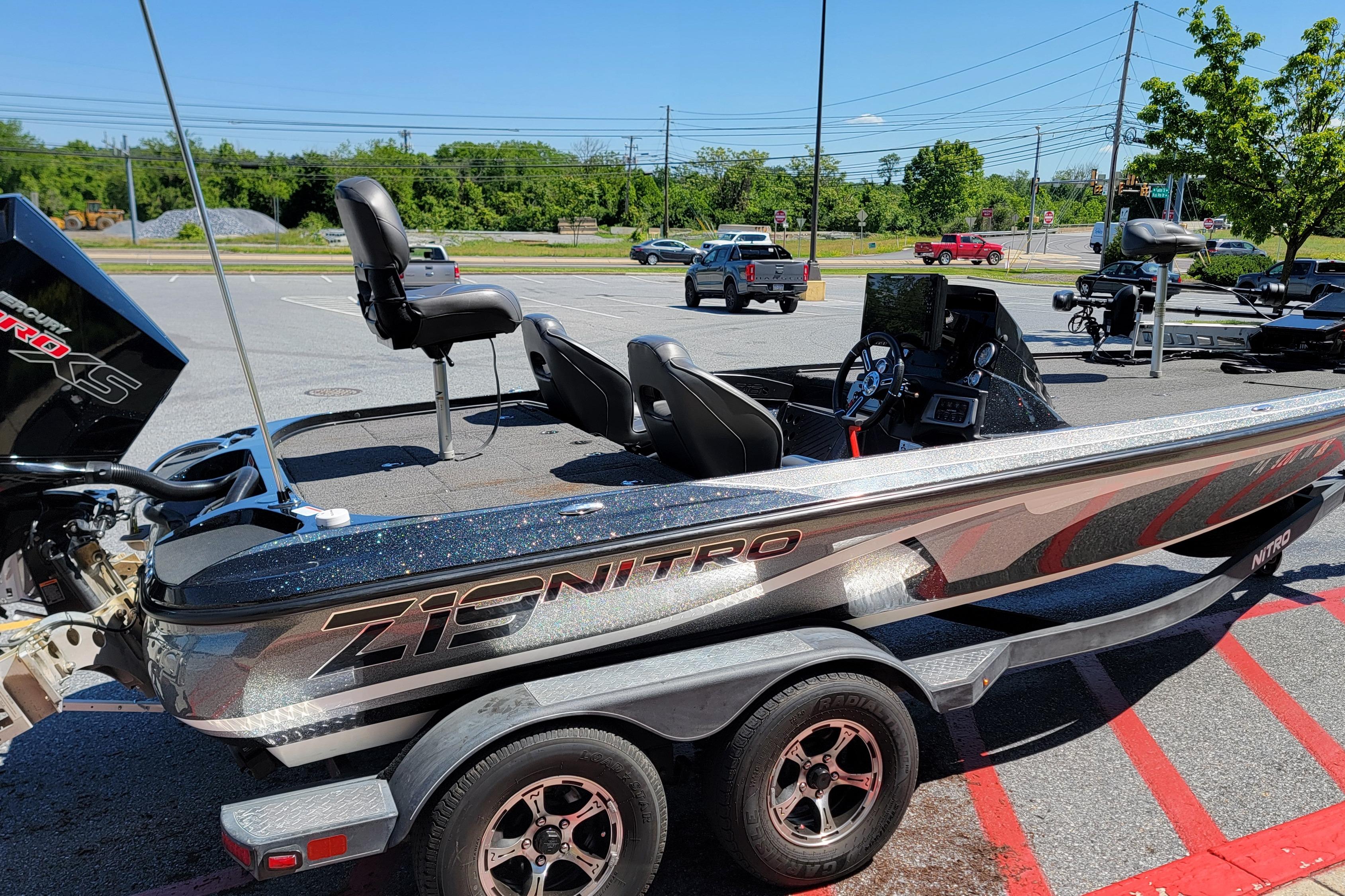 2020 Nitro Z19 Pro boat parked on trailer in sunny parking lot.