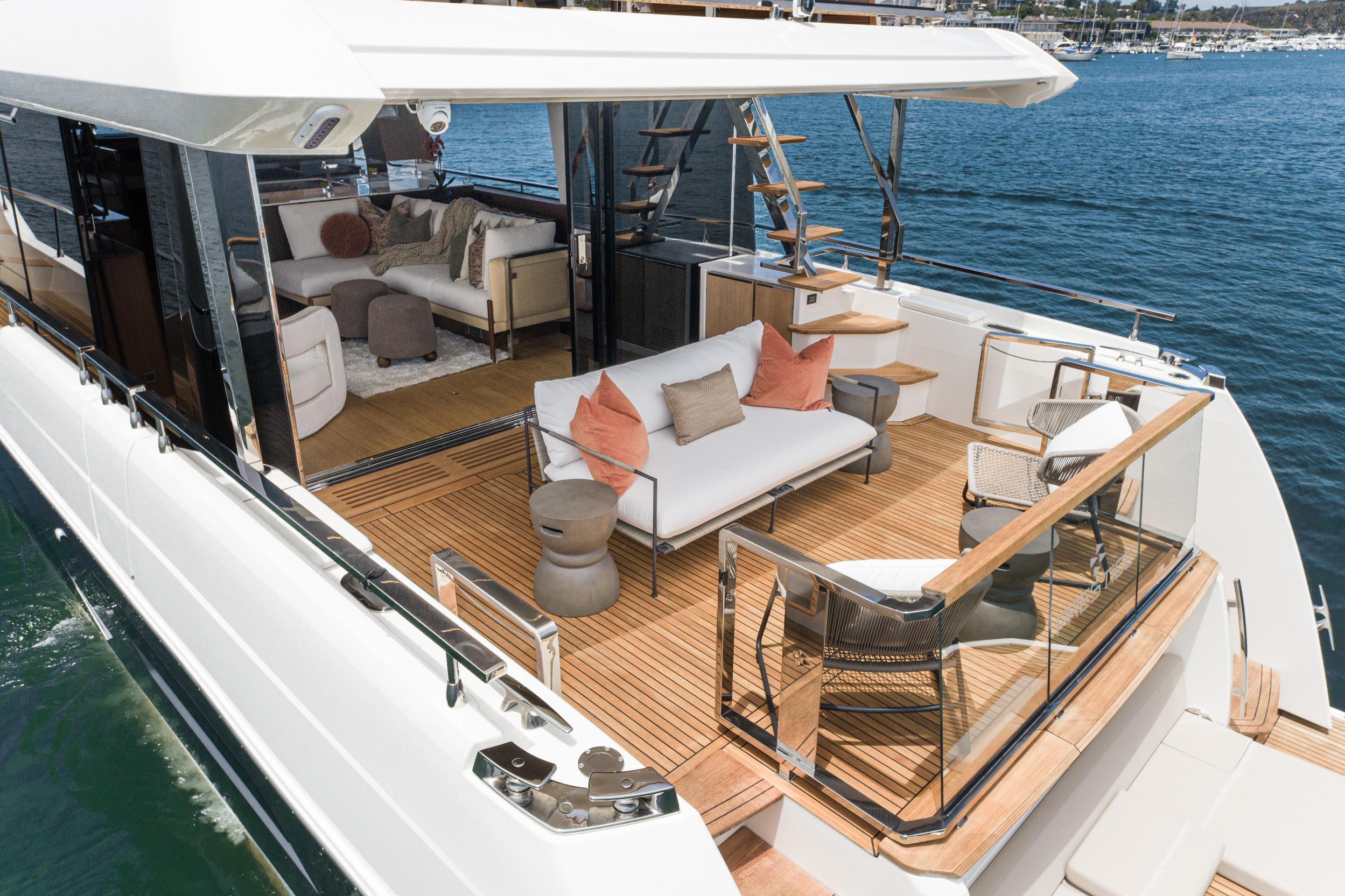 Luxurious 2024 Prestige X60 yacht with elegant outdoor seating and modern interior design.