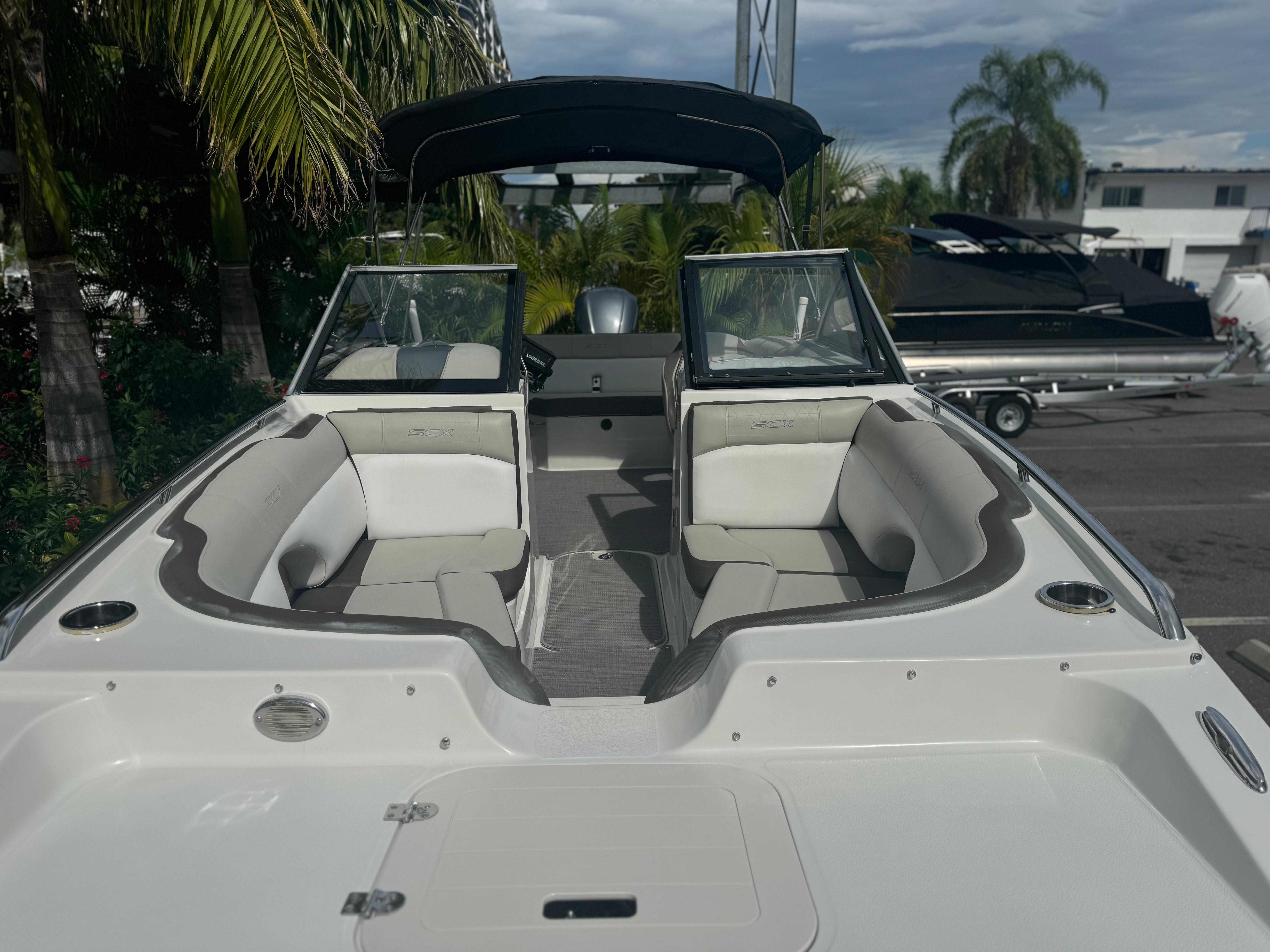 2017 Starcraft 230 OB SCX EXT boat with spacious seating and sleek design.