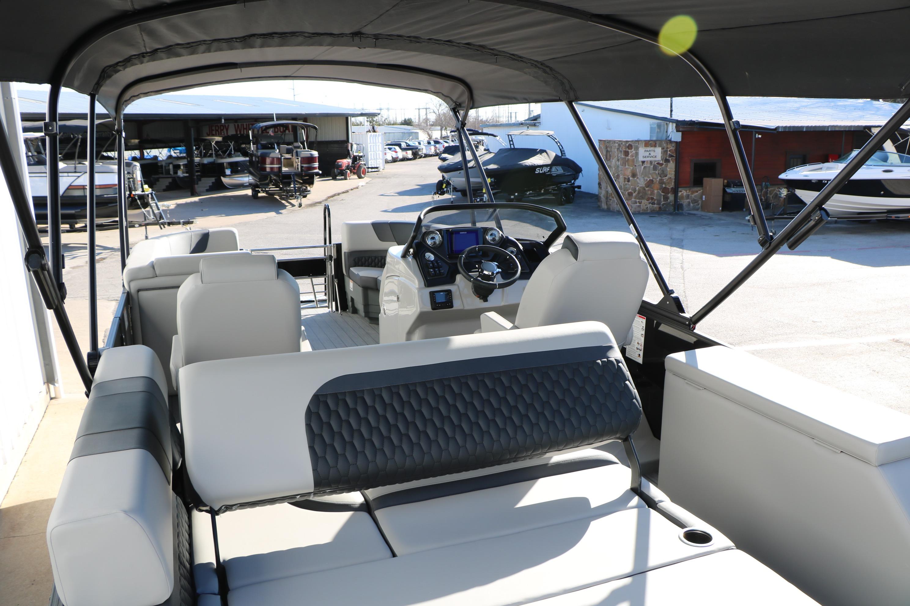 2026 Sylvan L3 CLZ DH pontoon boat interior with modern seating and steering console.