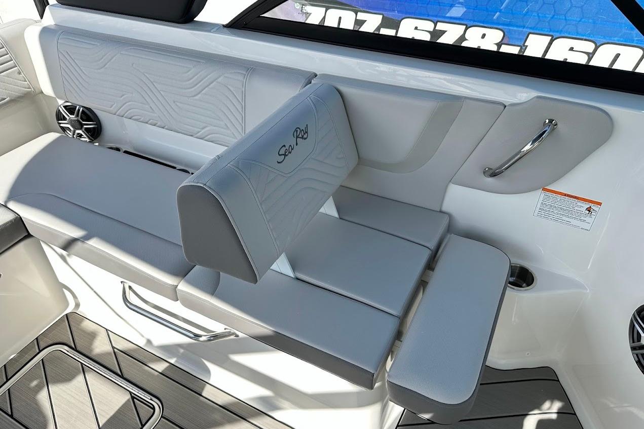 2026 Sea Ray SDX 230 Surf boat interior with gray seating and stylish design.