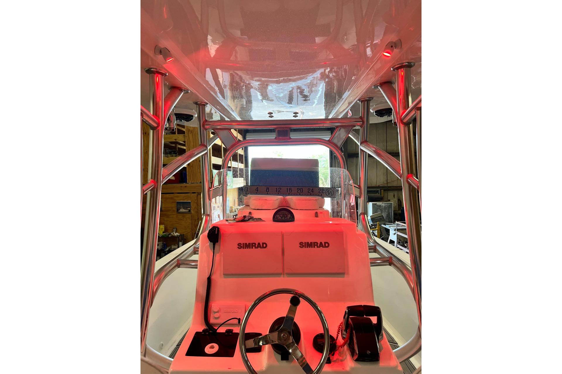 Interior view of 2021 Custom Infusion 34 CC boat with Simrad navigation system.