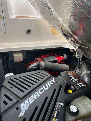Engine compartment of a 2001 Sea Ray 340 Sundancer with Mercury engine.
