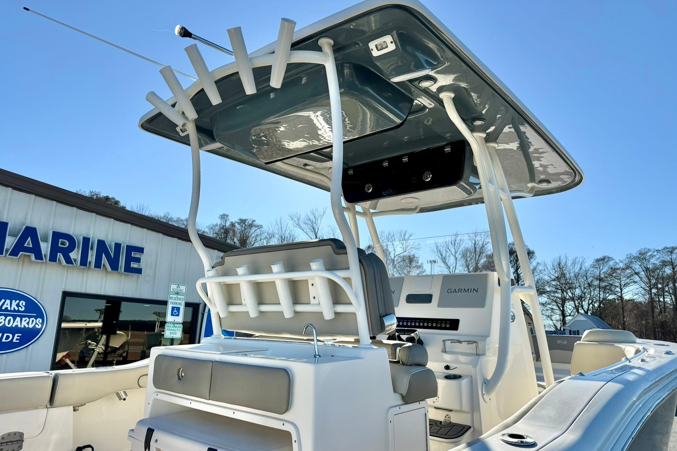 2021 Key West 263 FS boat with T-top and Garmin electronics at a marine dealership.
