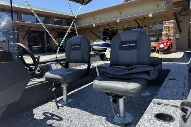 2026 Tracker Pro Guide V-16 SC boat interior with two gray seats.