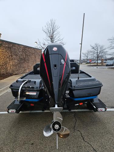 2025 Nitro Z21 XL boat, rear view, parked in a lot.
