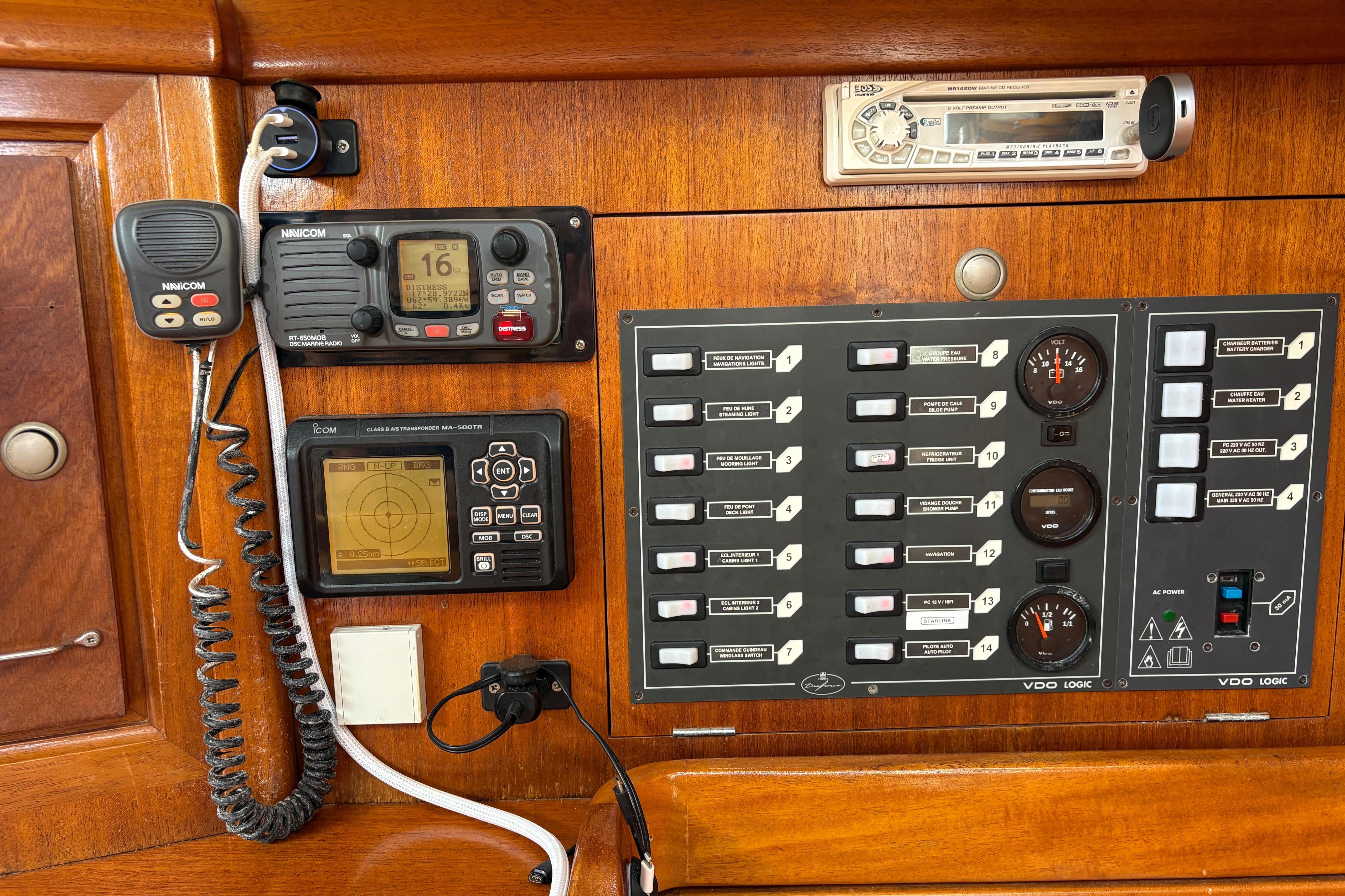 Control panel of a 1998 Dufour 35 Classic yacht with navigation and communication equipment.