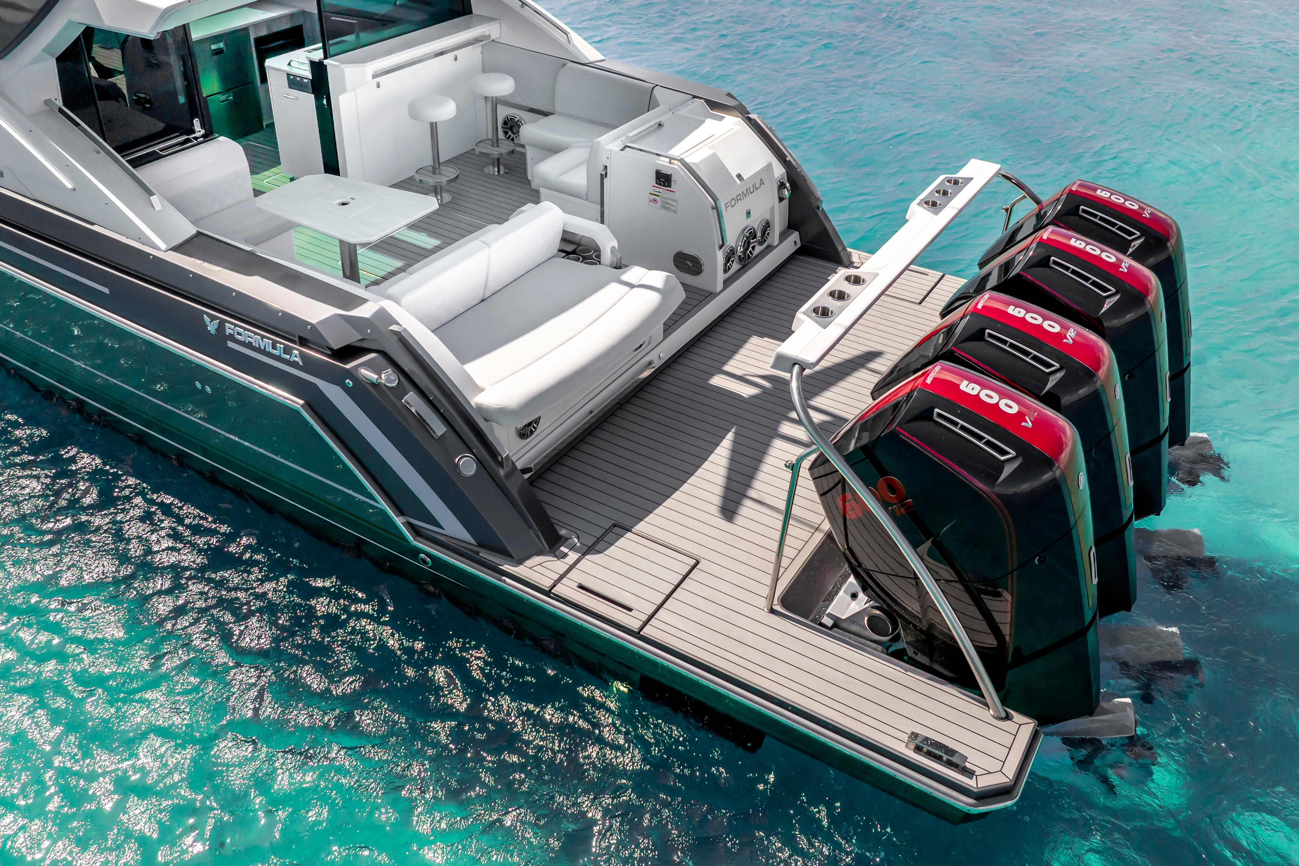 2022 Formula 500 Super Sport Crossover yacht with powerful engines on clear blue water.