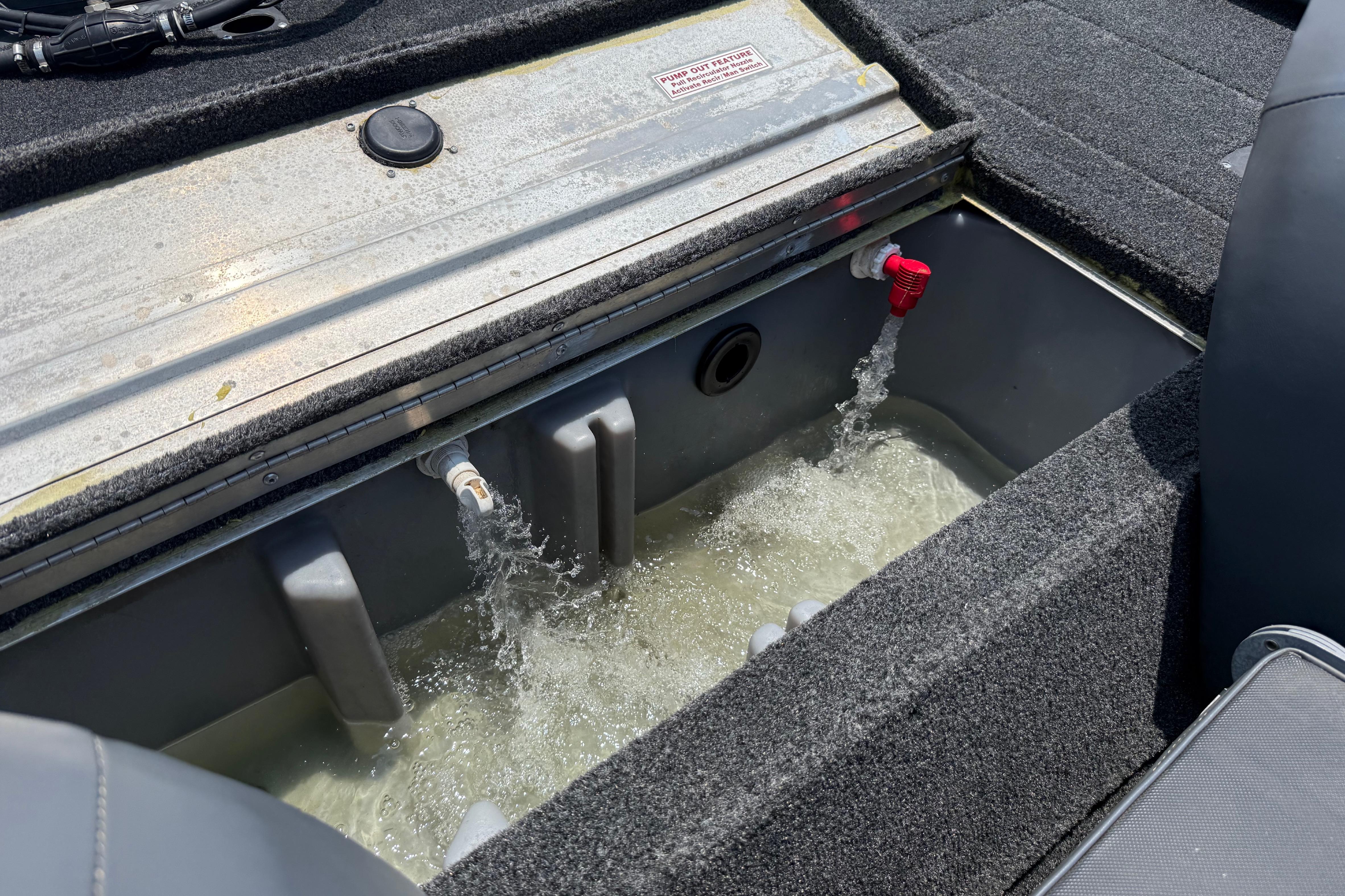 Livewell system in a 2015 Tracker Pro Team 190 TX boat, water flowing actively.