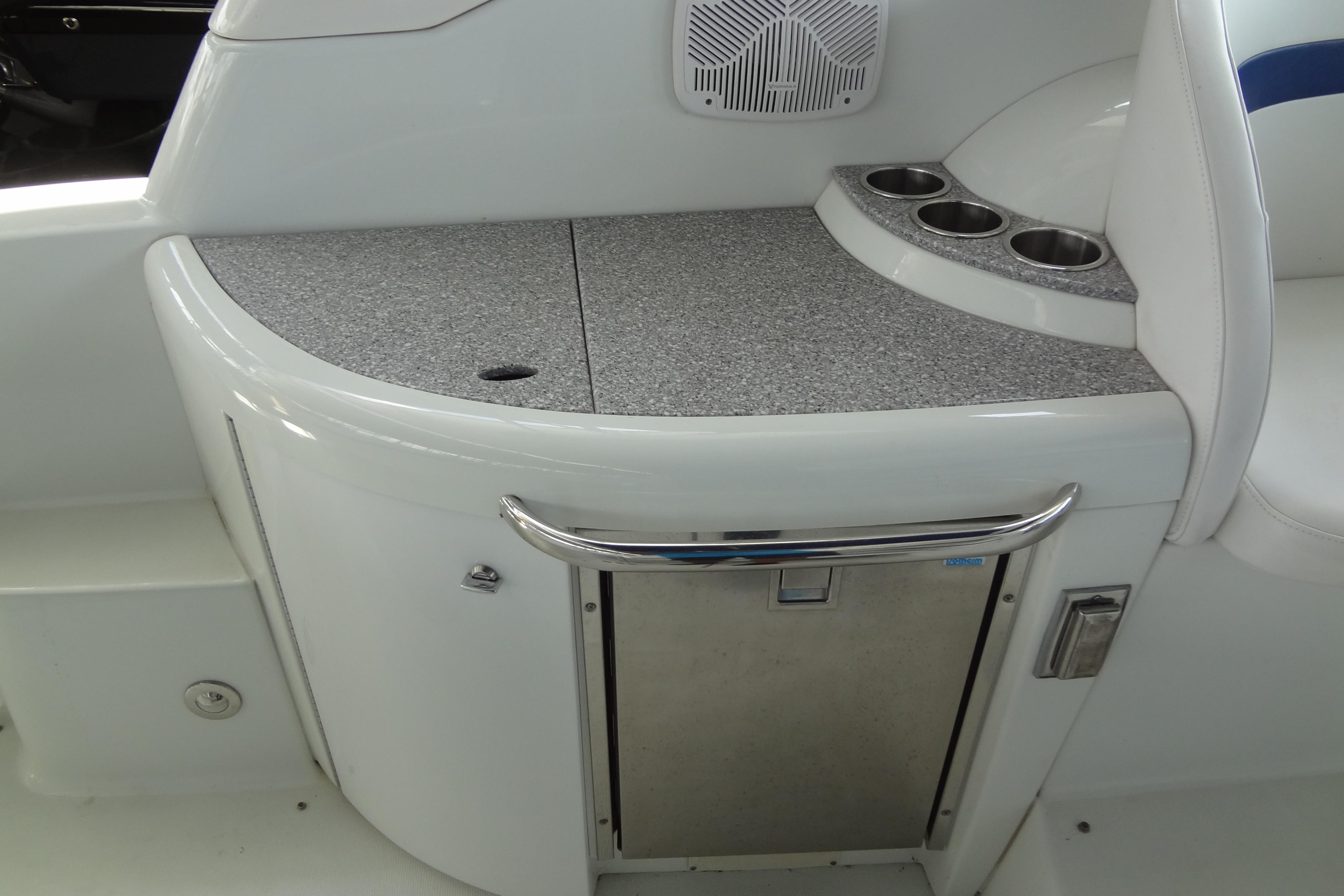 2007 Formula 34 Performance Cruiser interior with countertop, cup holders, and storage compartment.