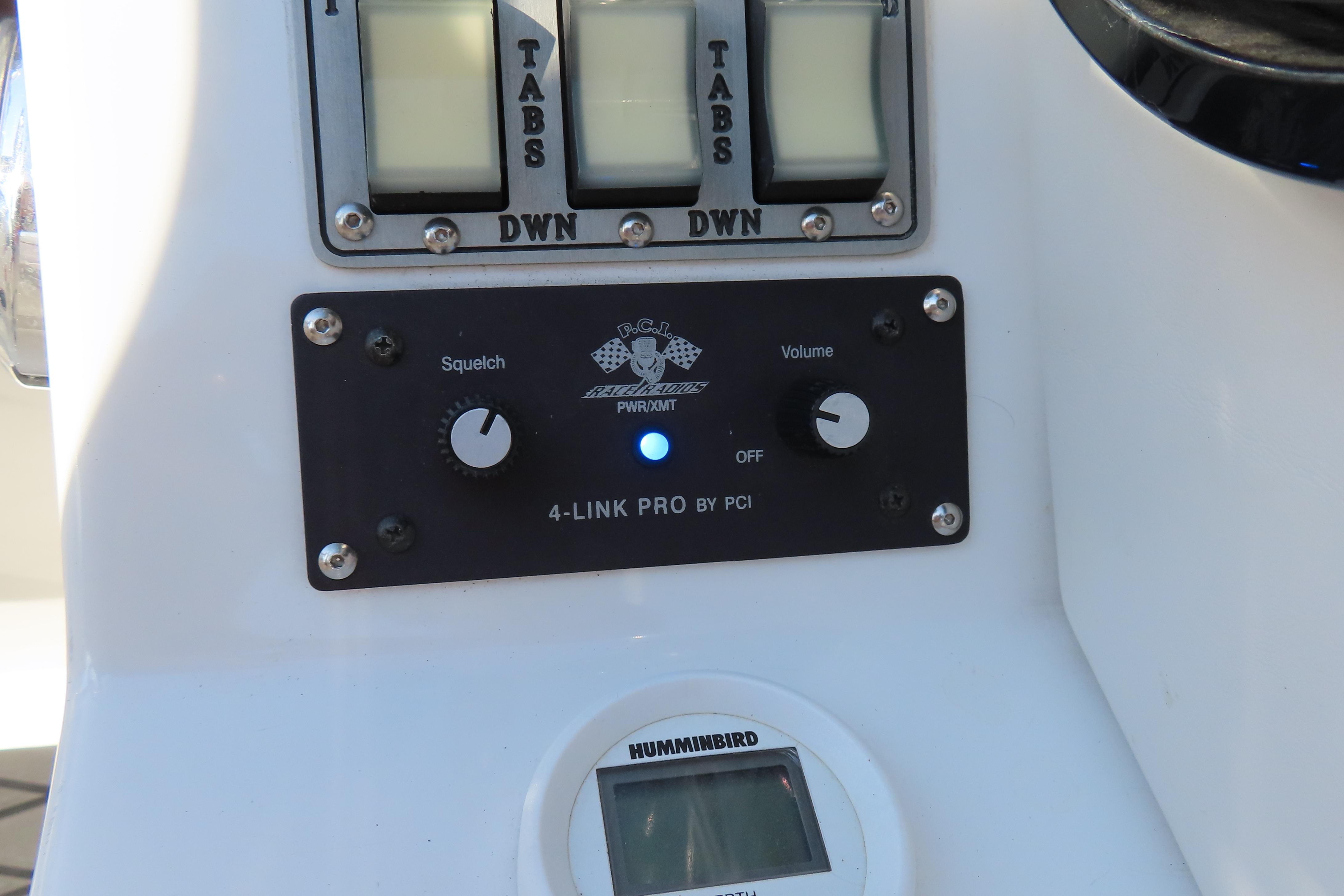 Control panel of a 2013 Nordic 39 POKER RUN boat with audio and tab controls.
