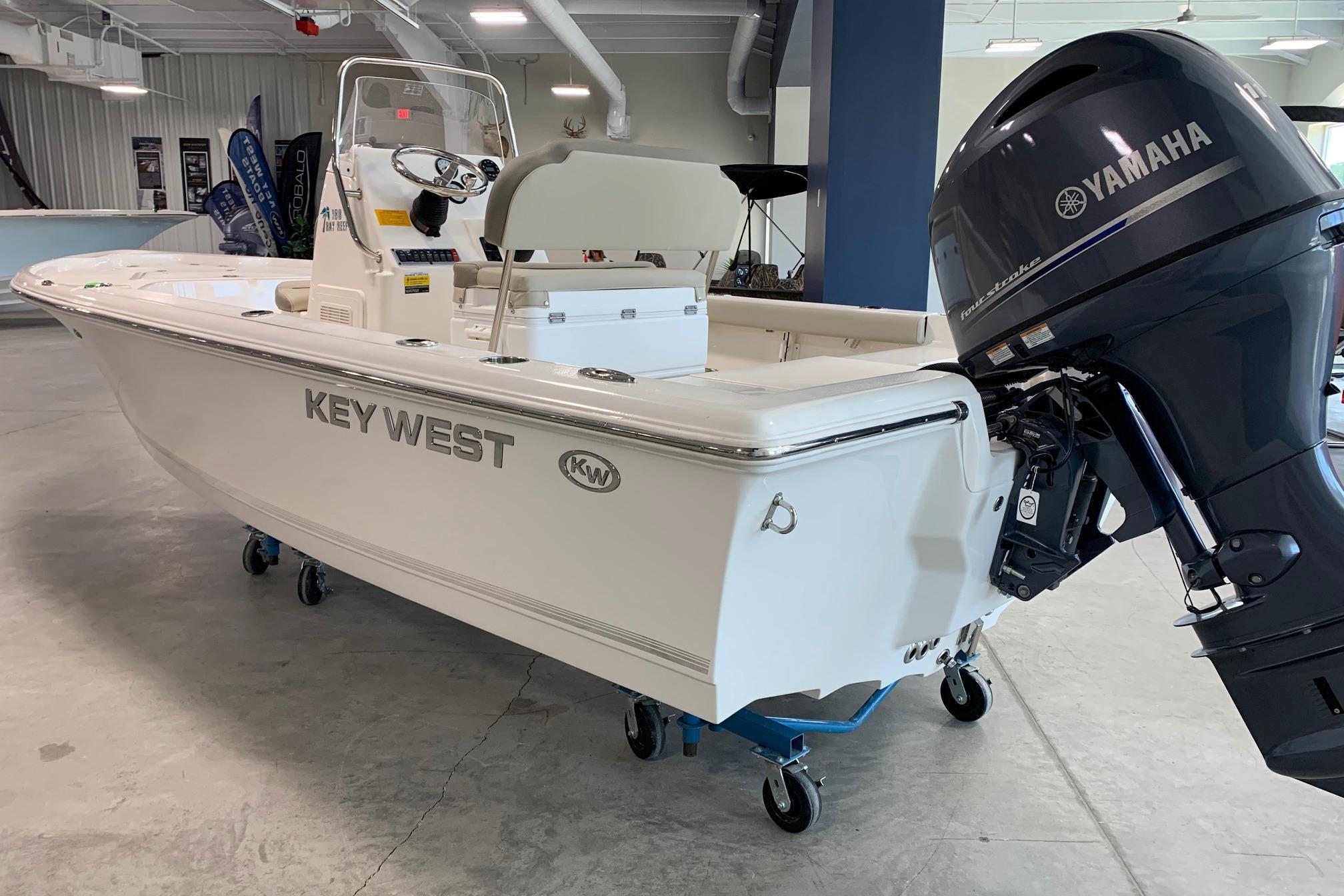 2026 Key West 188 Bay Reef boat with Yamaha outboard motor in showroom.